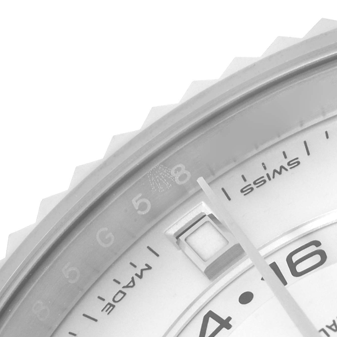 The image shows a close-up of the dial and bezel of a Rolex Sky-Dweller 326934 Men's Stainless Steel White Dial 326934 Men's Stainless Steel White Dial watch.