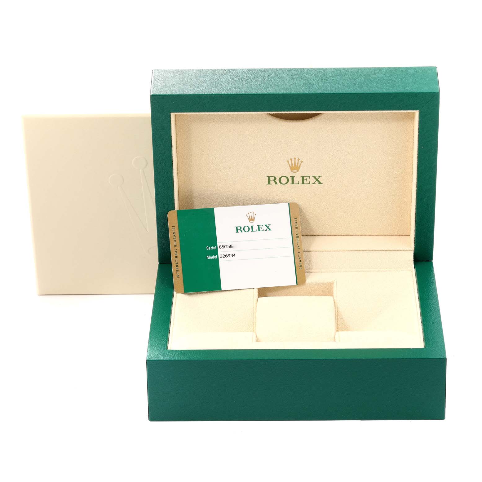 The image shows an open green Rolex watch box with a Sky-Dweller model card and an outer cream-colored box.