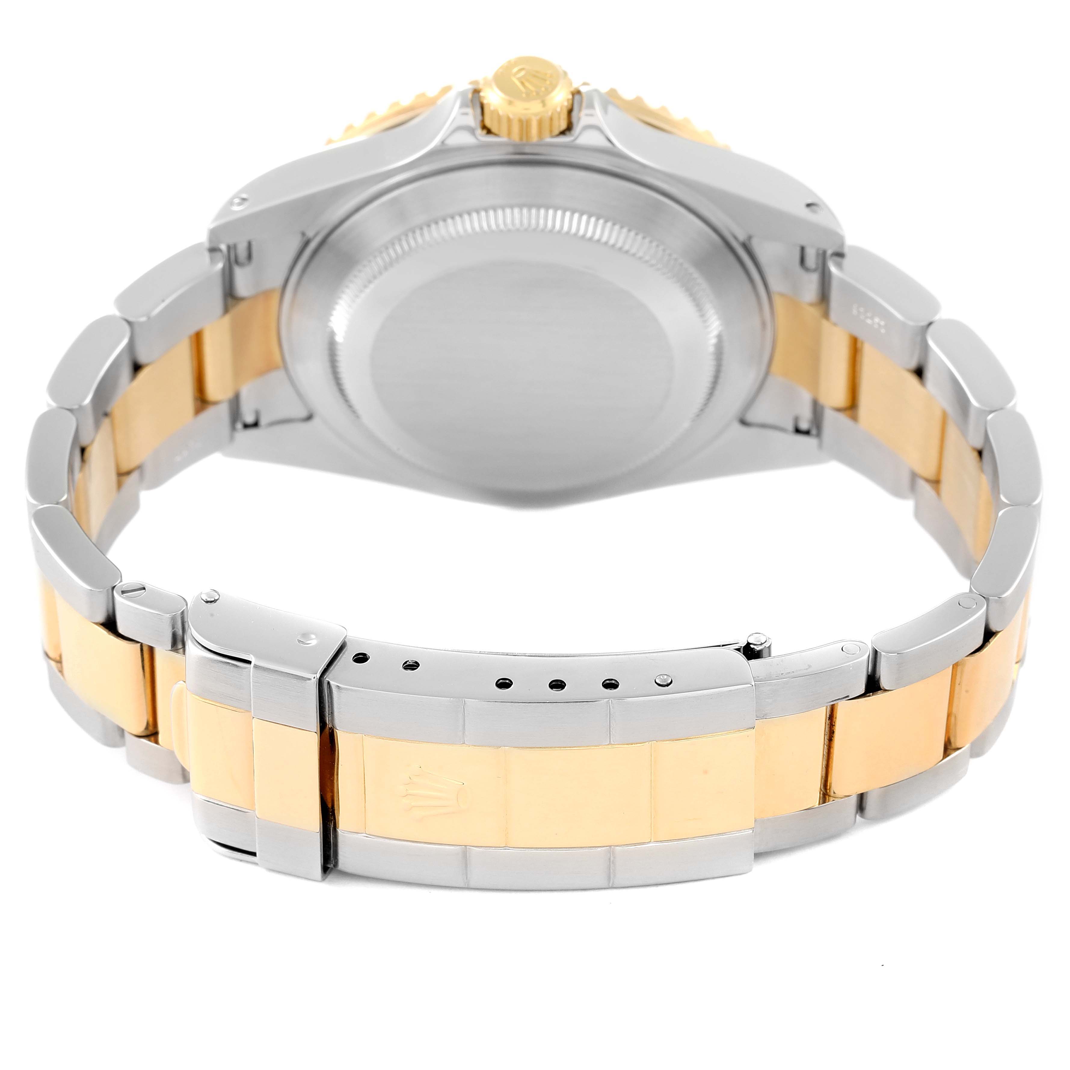 This image shows the back case and two-tone bracelet of the Rolex Submariner 16613 Men's Steel and Gold (two tone) Blue Dial 16613 Men's Steel and Gold (two tone) Blue Dial watch.