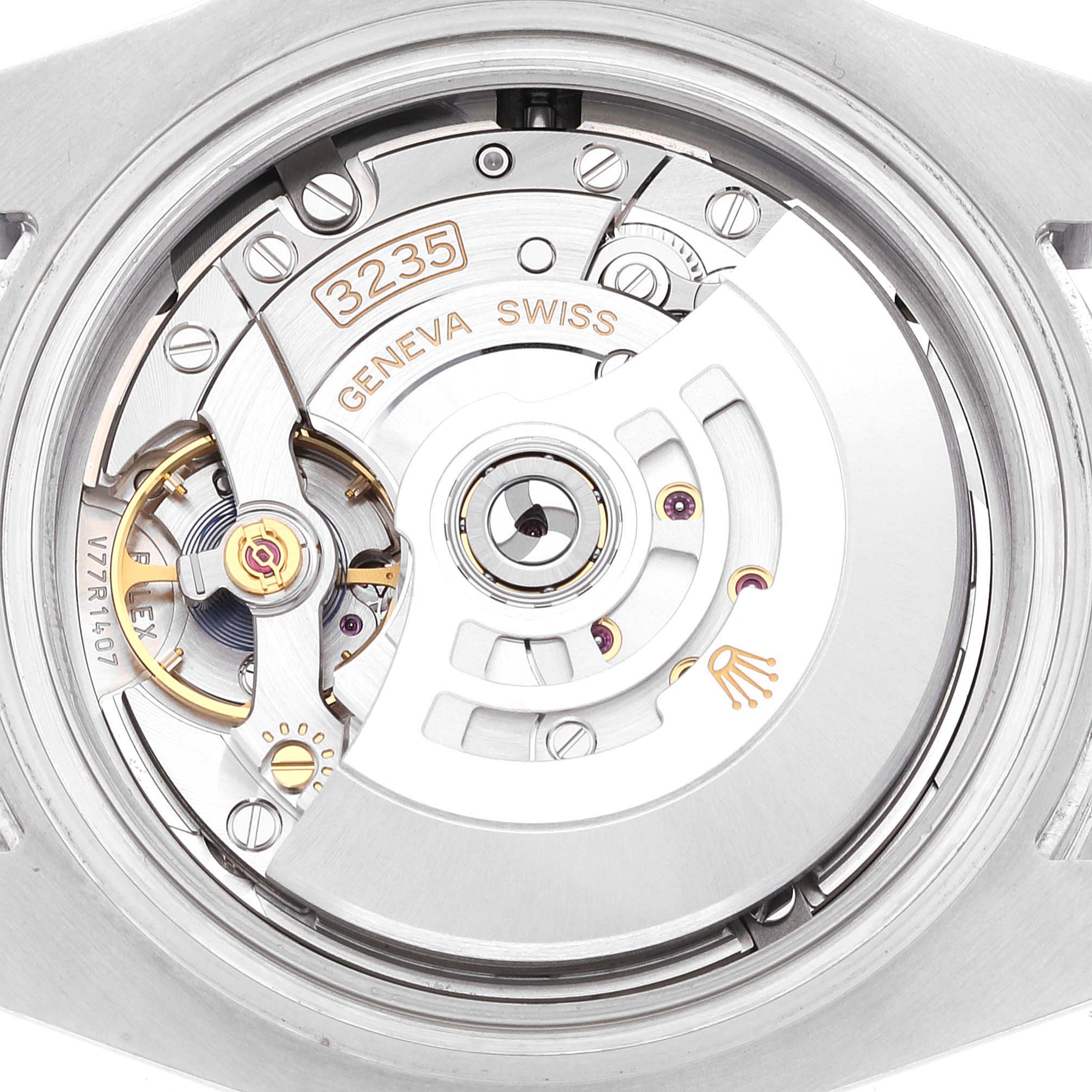 This is a close-up view of the movement inside a Rolex Submariner 126610 Men
s Stainless Steel Black Dial 126610 Men
s Stainless Steel Black Dial watch, showing the intricate mechanics and rotor.