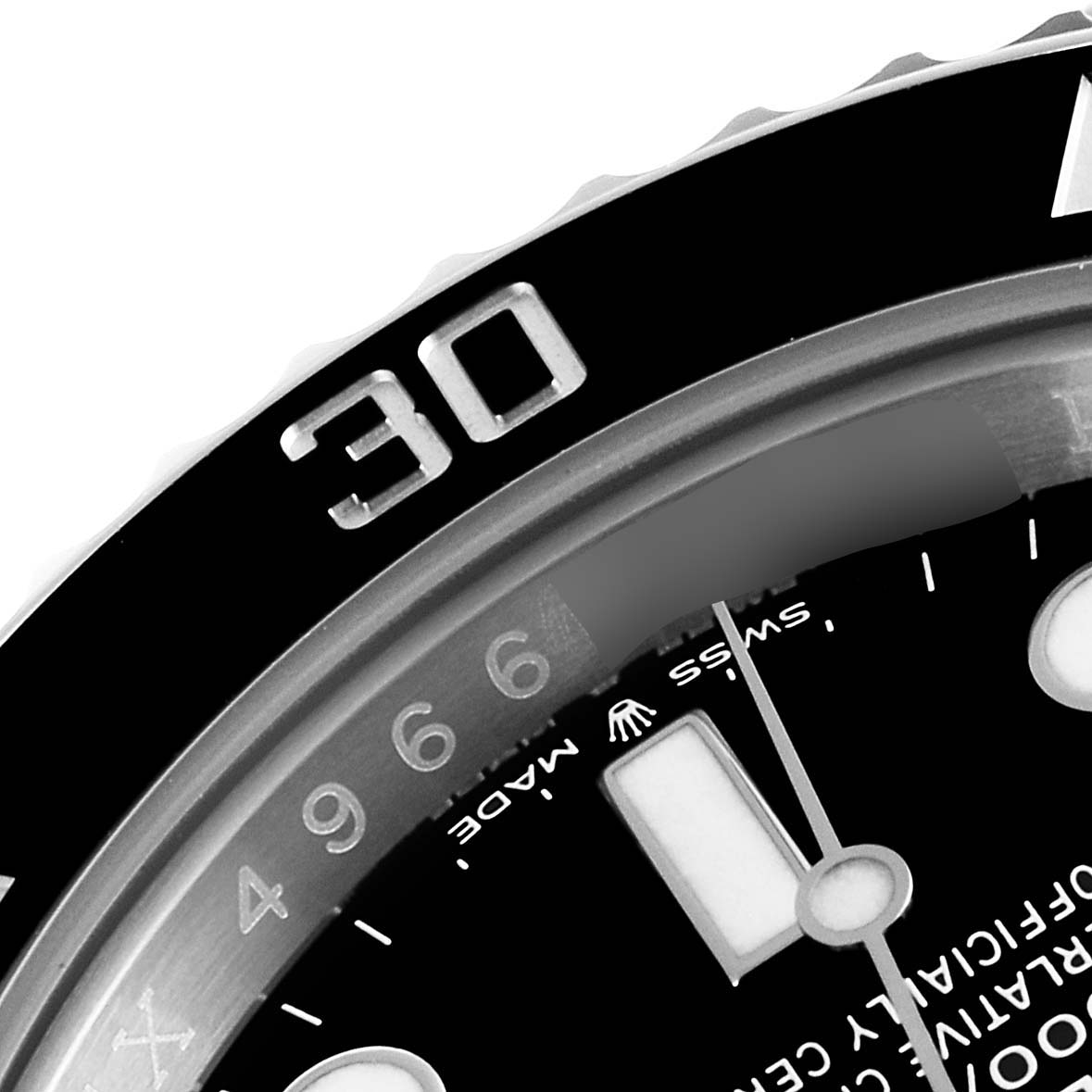 This image shows a close-up of the bezel, dial markers, and part of the minute hand of a Rolex Submariner 124060 Men
s Stainless Steel Black Dial 124060 Men
s Stainless Steel Black Dial watch.