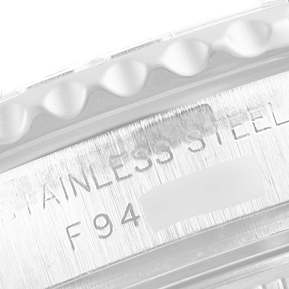 The image shows a close-up of the engraved casing of a Rolex Yacht-Master 169622 Women's Stainless Steel Silver Dial 169622 Women's Stainless Steel Silver Dial watch, highlighting the number and "STAINLESS STEEL" text.