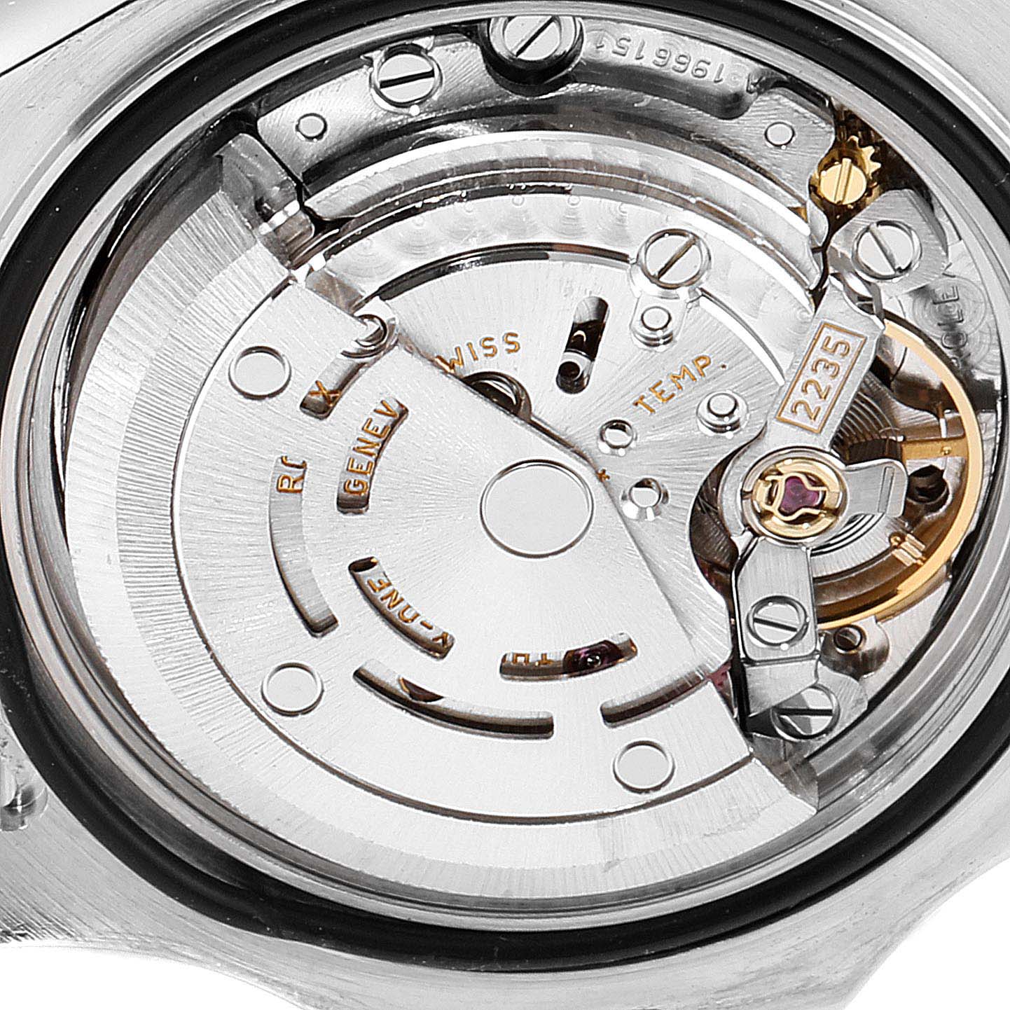 Close-up of the internal movement mechanism of the Rolex Yacht-Master 169622 Women's Stainless Steel Silver Dial 169622 Women's Stainless Steel Silver Dial watch, showing gears and inscriptions.