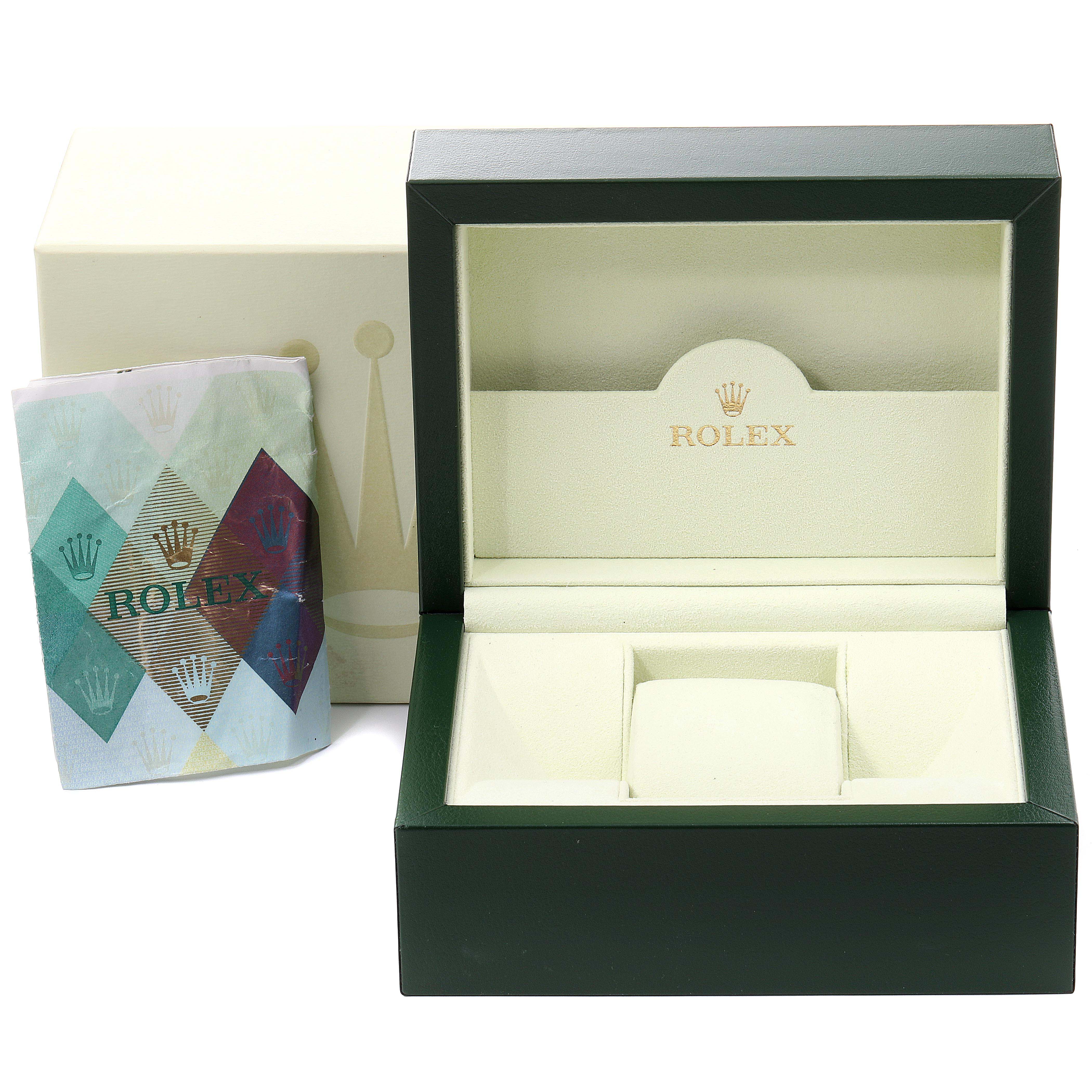 The image shows an open box with "Rolex" branding for the Yacht-Master model, alongside its outer box and booklet.