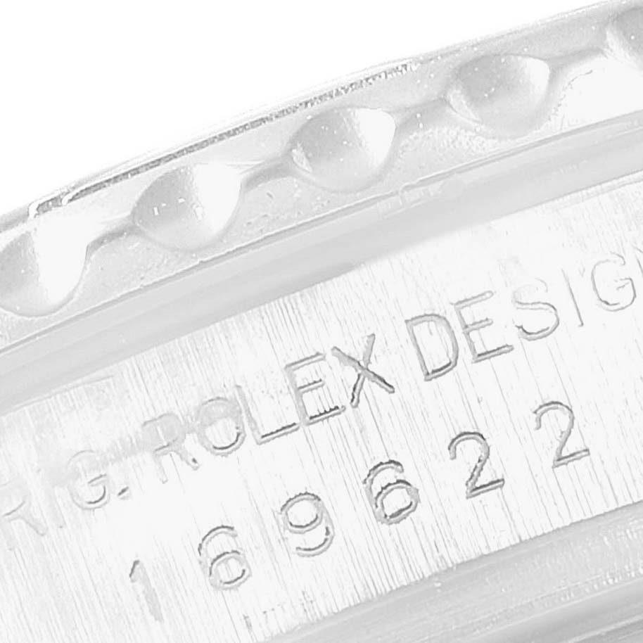 This image shows a close-up of the bezel and engravings on the side of a Rolex Yacht-Master 169622 Women's Stainless Steel Silver Dial 169622 Women's Stainless Steel Silver Dial watch.