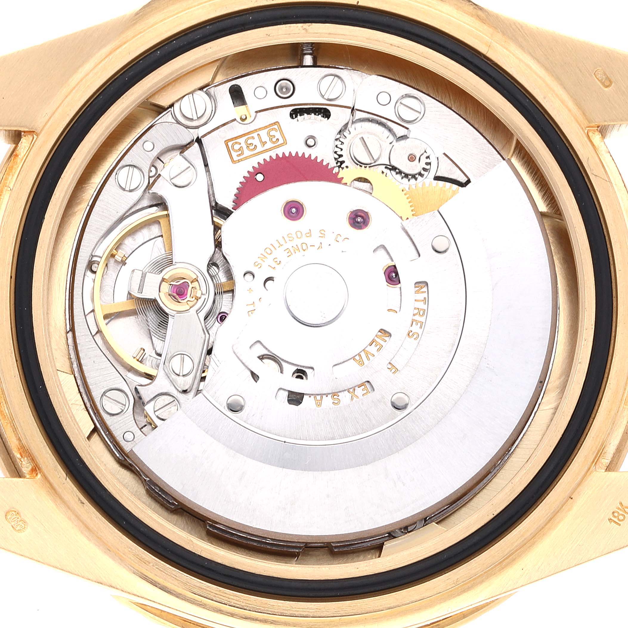 The image shows the Rolex Yacht-Master 16628 Men's Yellow Gold Champagne Dial 16628 Men's Yellow Gold Champagne Dial watch's movement from a top-down angle, highlighting its intricate mechanisms.
