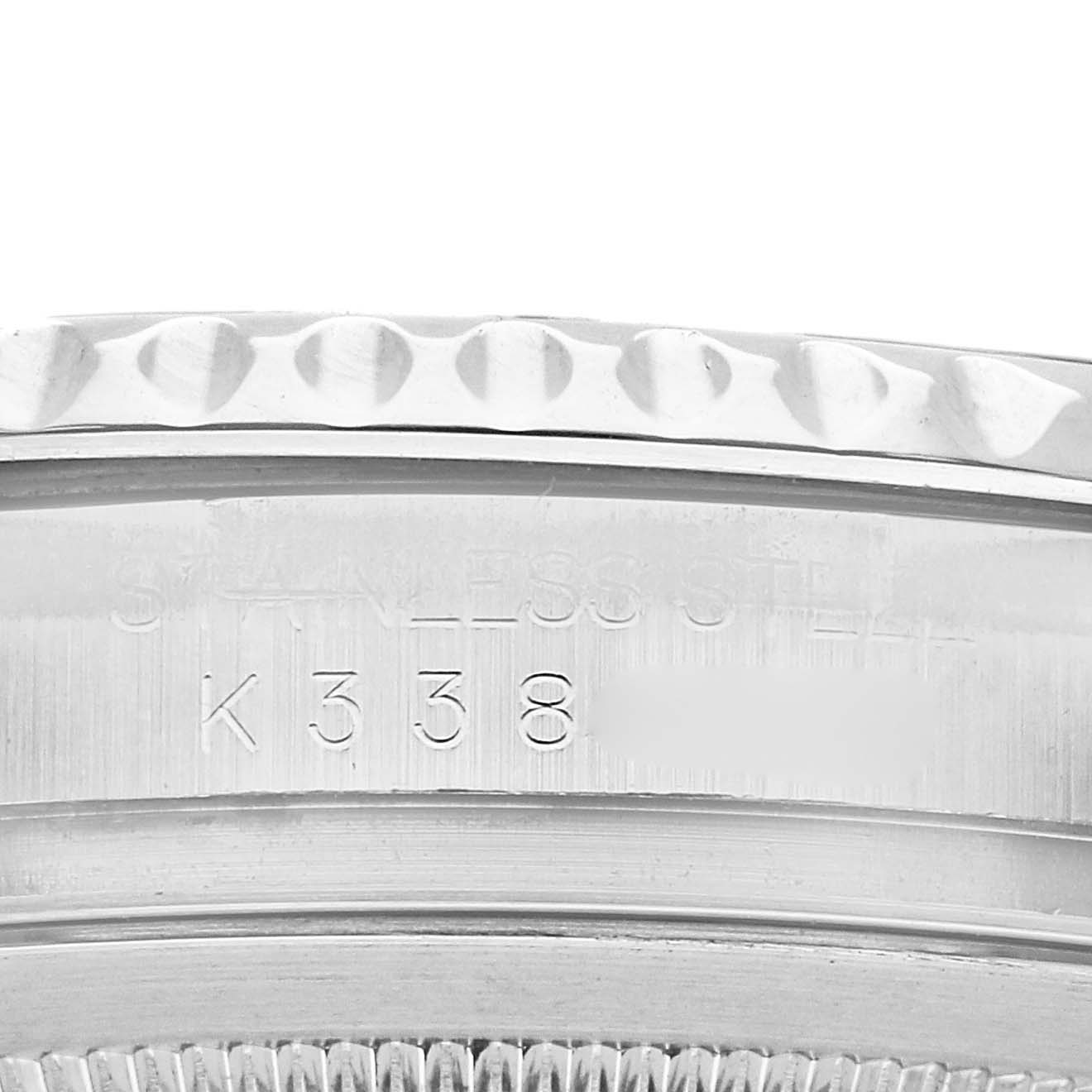 The image shows a close-up of the case side of a Rolex Yacht-Master 16622 Men's Stainless Steel Silver Dial watch, featuring text engravings.