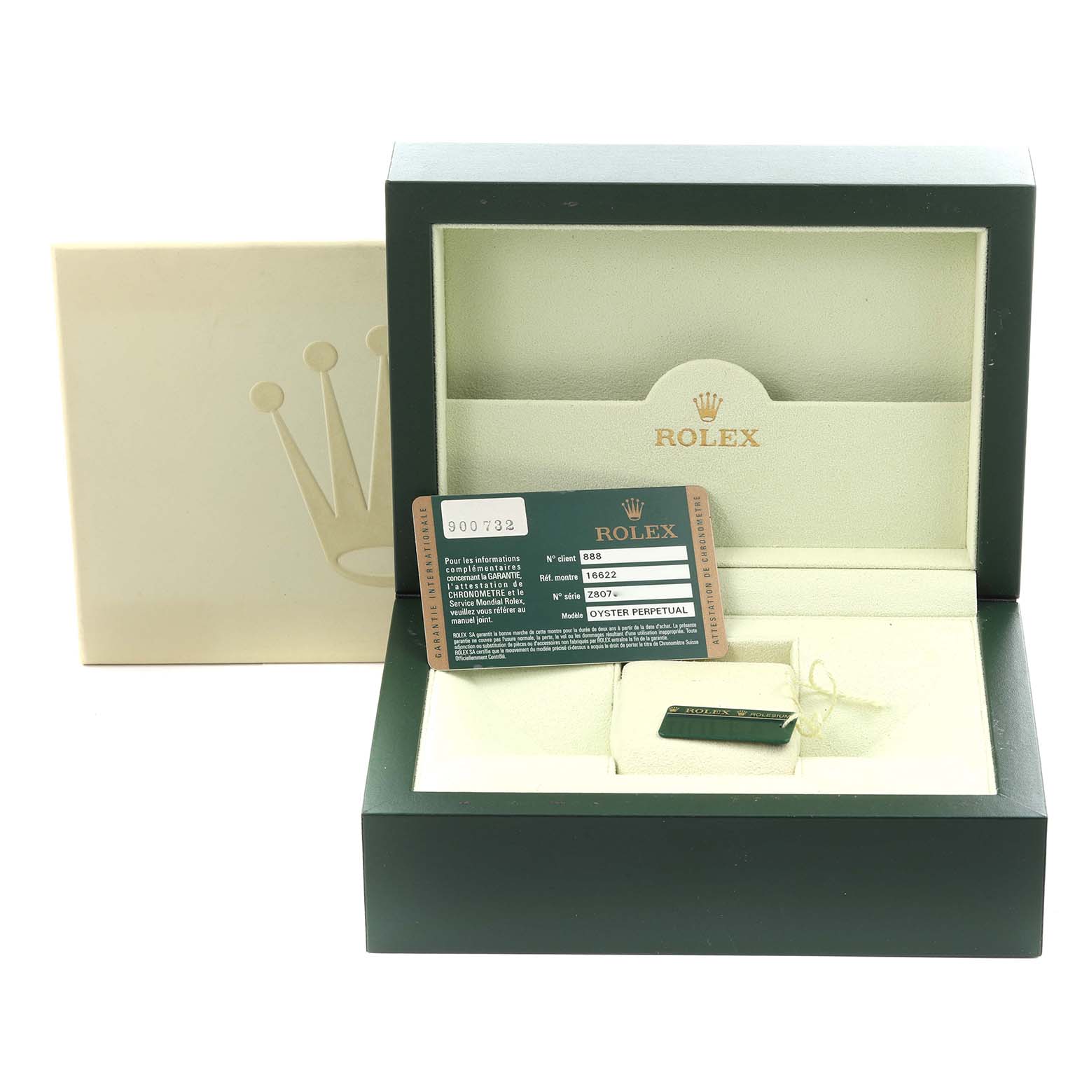 The image shows the packaging and accessories for a Rolex Yacht-Master 16622 Men
s Stainless Steel Silver Dial 16622 Men
s Stainless Steel Silver Dial, including the box and warranty card.
