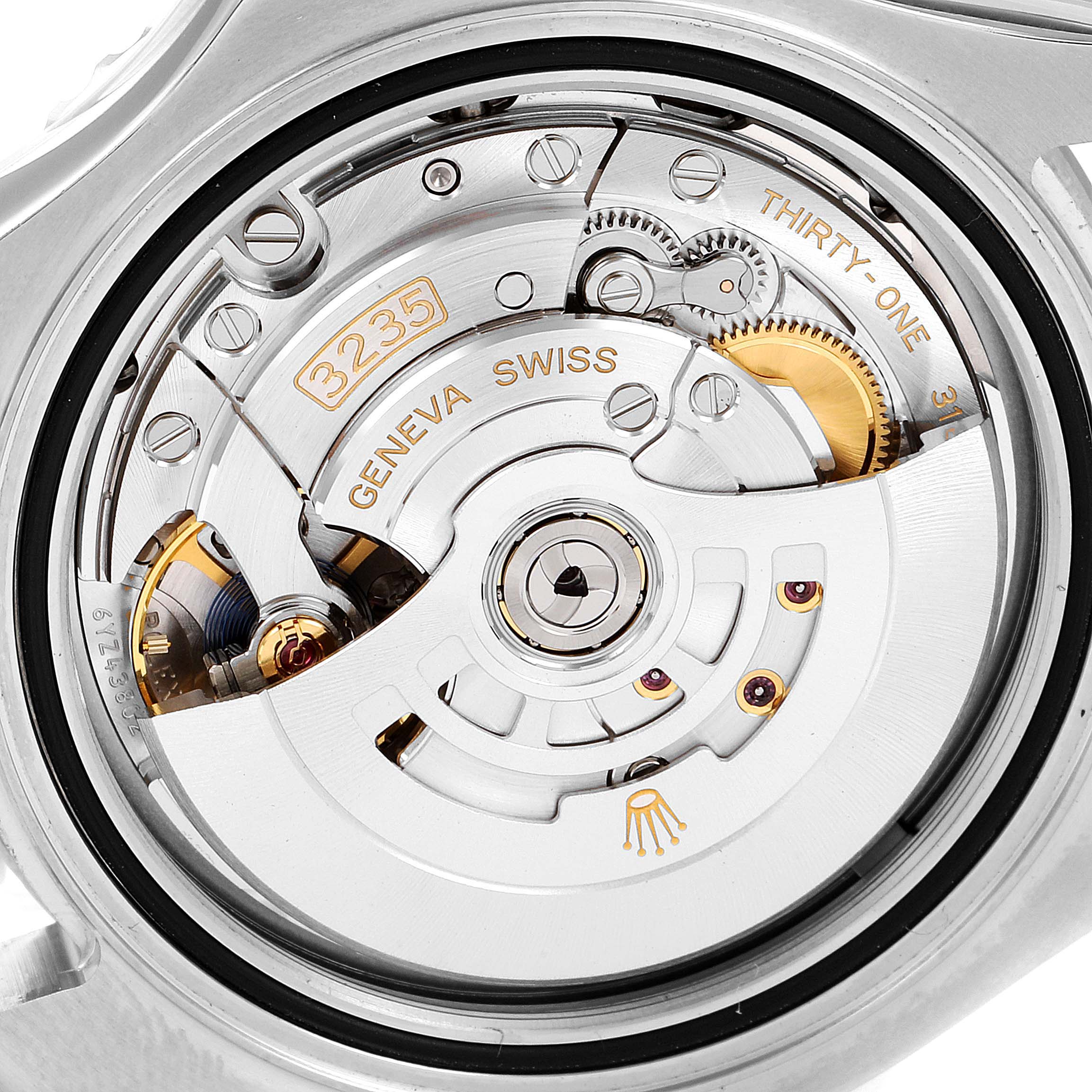 The image shows the movement mechanism of the Rolex Yacht-Master 126622 Men's Stainless Steel Blue Dial 126622 Men's Stainless Steel Blue Dial watch from an angled back view, highlighting its intricate parts.