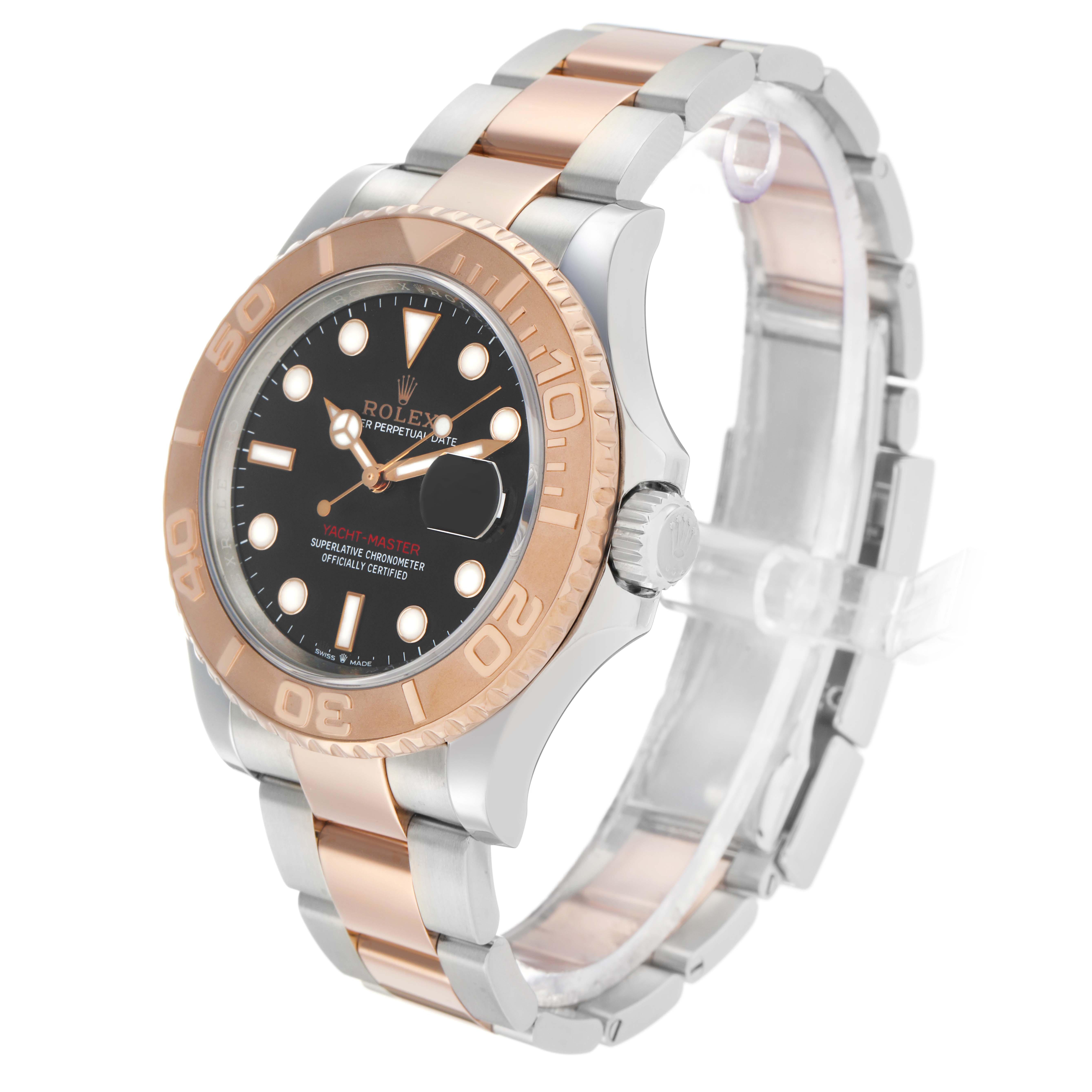 The Rolex Yacht-Master 126621 Men's Steel and Gold (two tone) Black Dial watch is shown from an angled side view, displaying its bezel, face, crown, and two-tone bracelet.