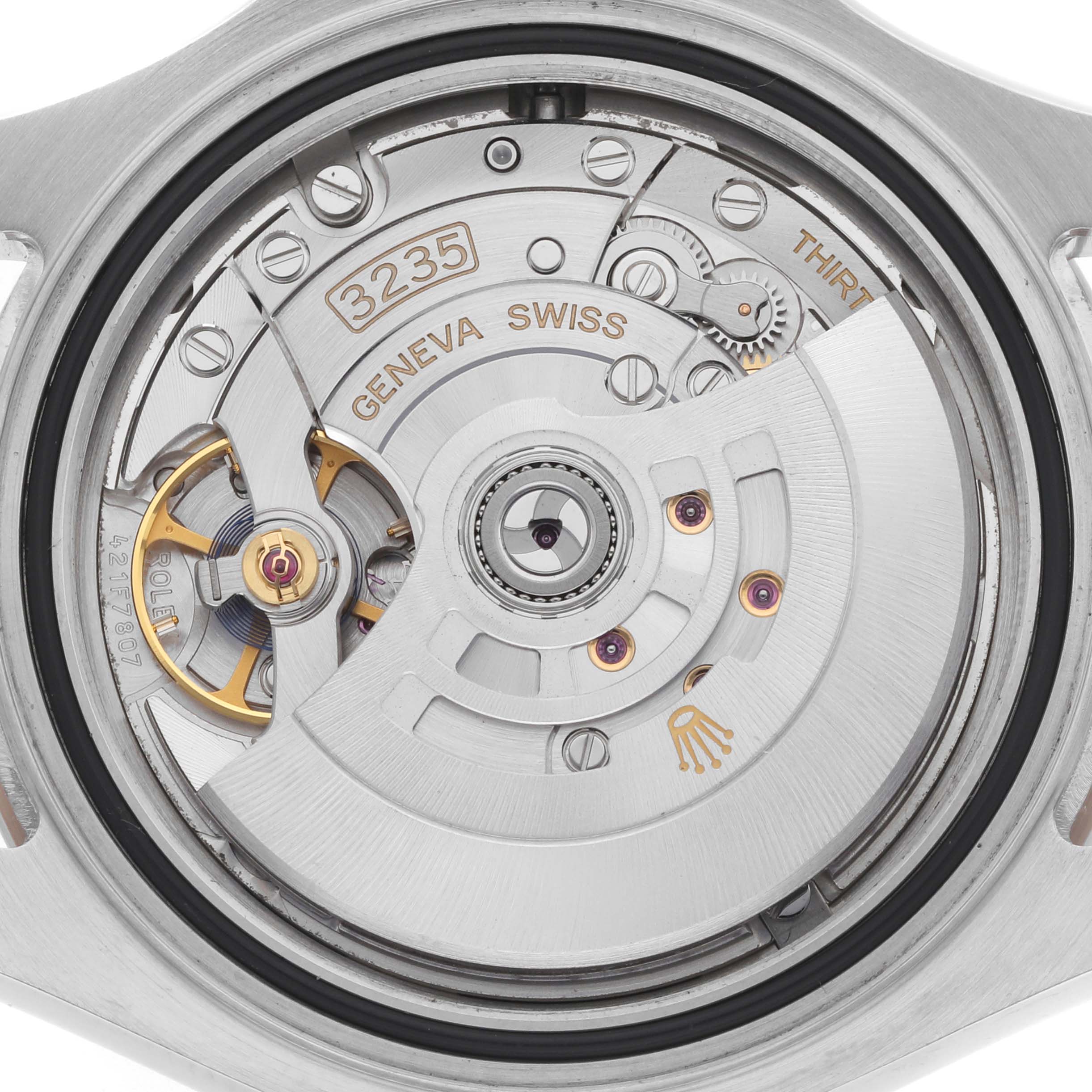 The image shows the movement mechanism of a Rolex Yacht-Master 126621 Men's Steel and Gold (two tone) Black Dial watch from a rear angle, revealing the intricate components.