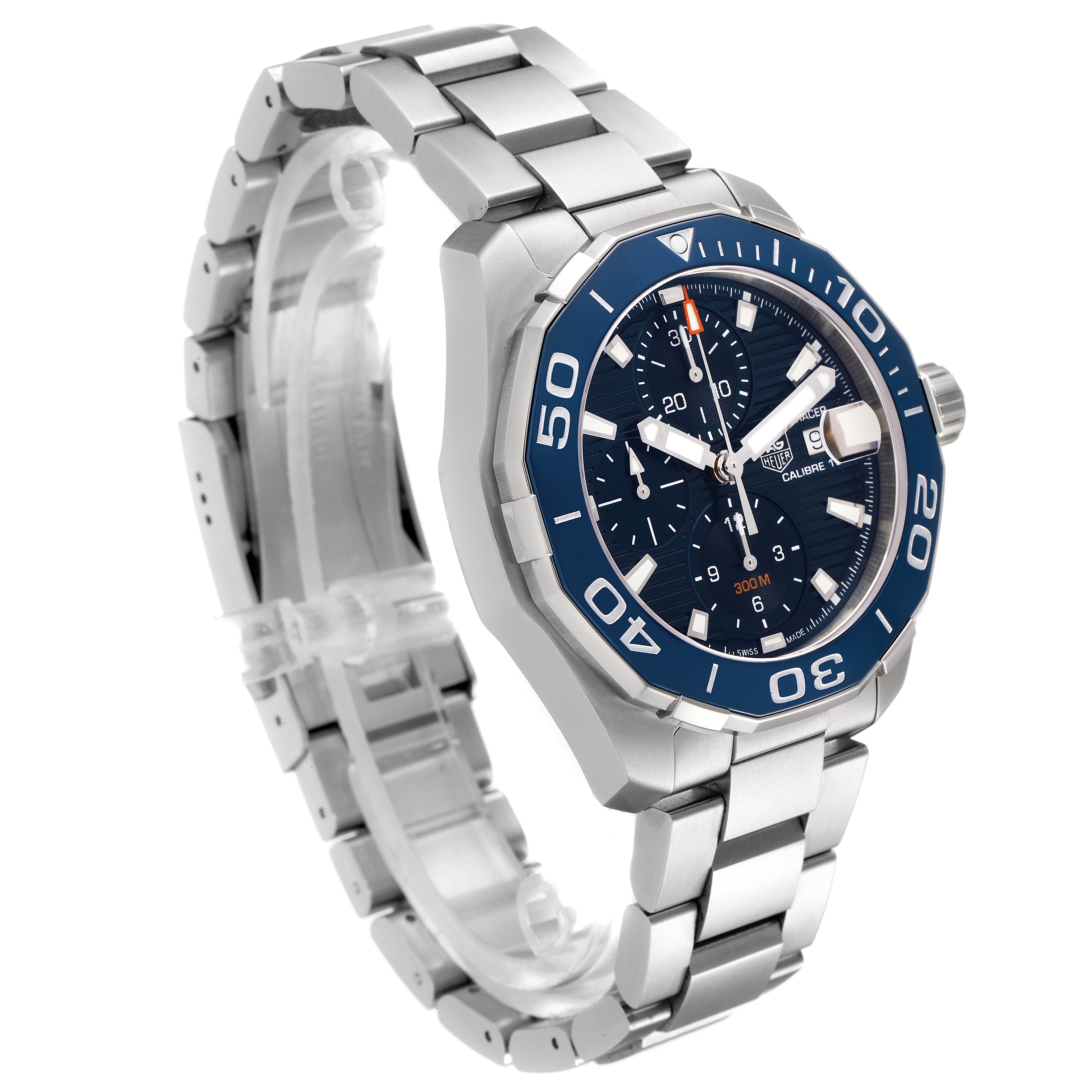 The Tag Heuer Aquaracer CAY211B.BA0927 Men's Stainless Steel Blue Dial CAY211B.BA0927 Men's Stainless Steel Blue Dial watch is shown at a three-quarter angle, highlighting its blue bezel, dial, and metal bracelet.