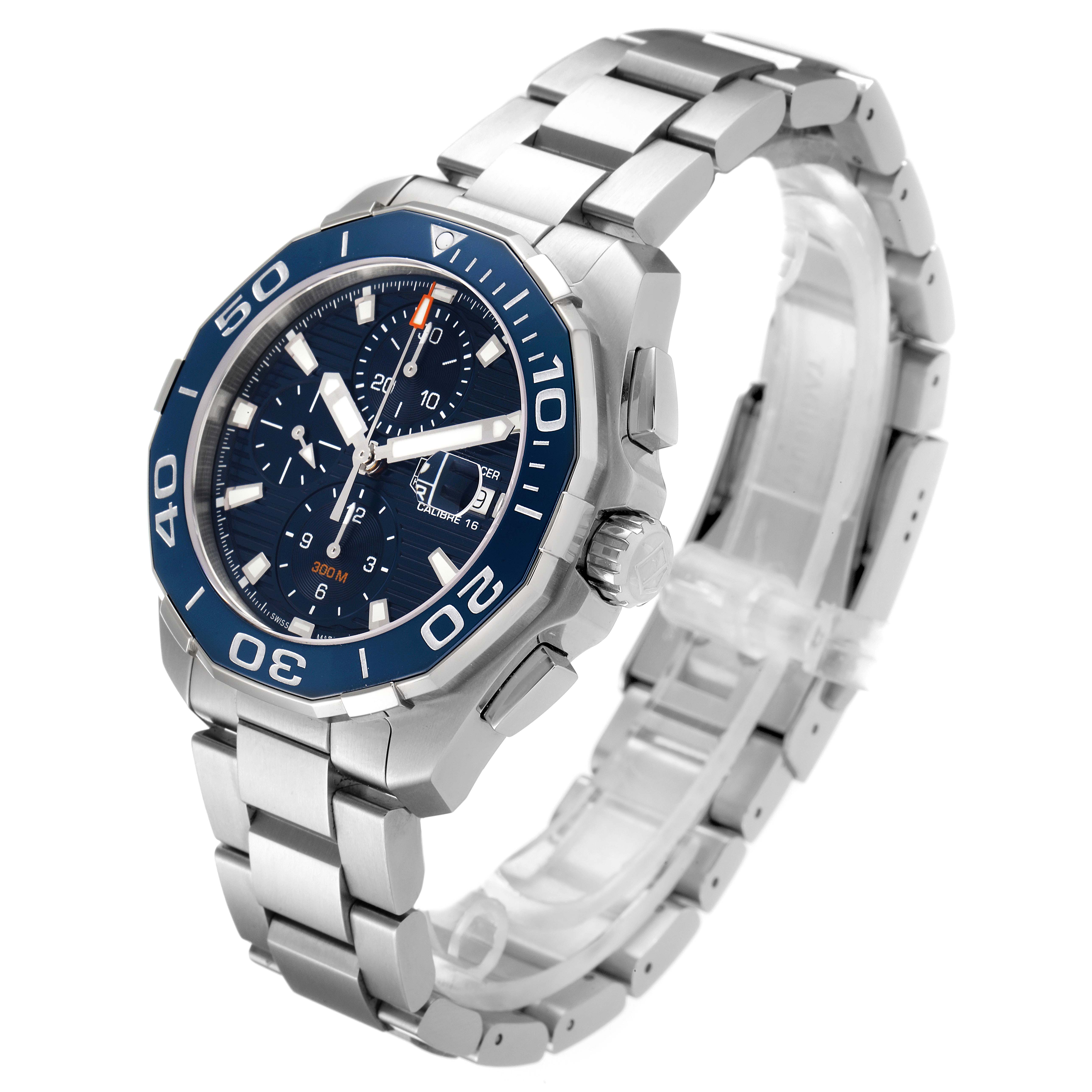 The image shows a Tag Heuer Aquaracer CAY211B.BA0927 Men's Stainless Steel Blue Dial CAY211B.BA0927 Men's Stainless Steel Blue Dial watch from a high angle, highlighting the dial, bezel, and metal bracelet.