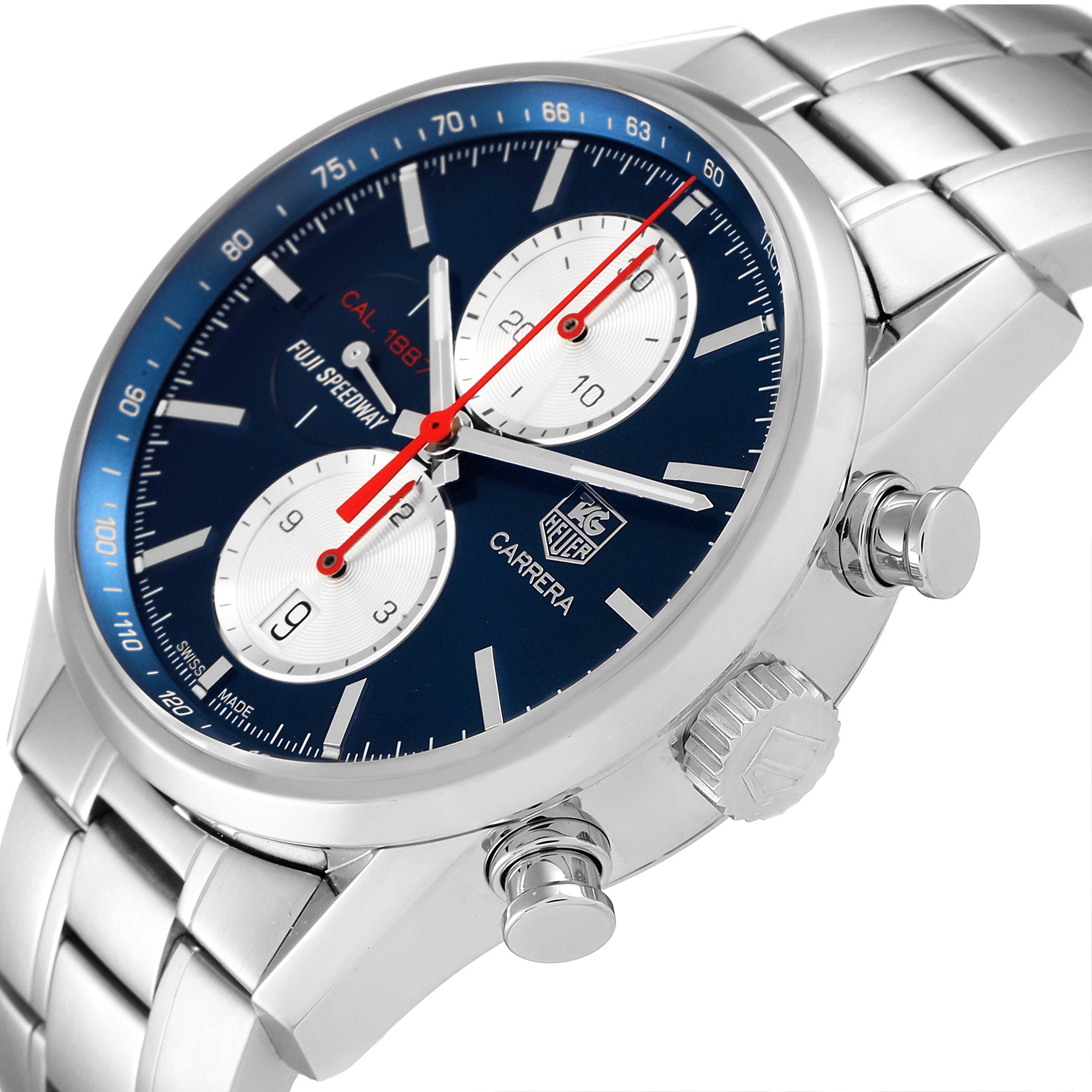 The image shows a Tag Heuer Carrera watch at an angle, highlighting the face, crown, pushers, and part of the stainless steel bracelet.