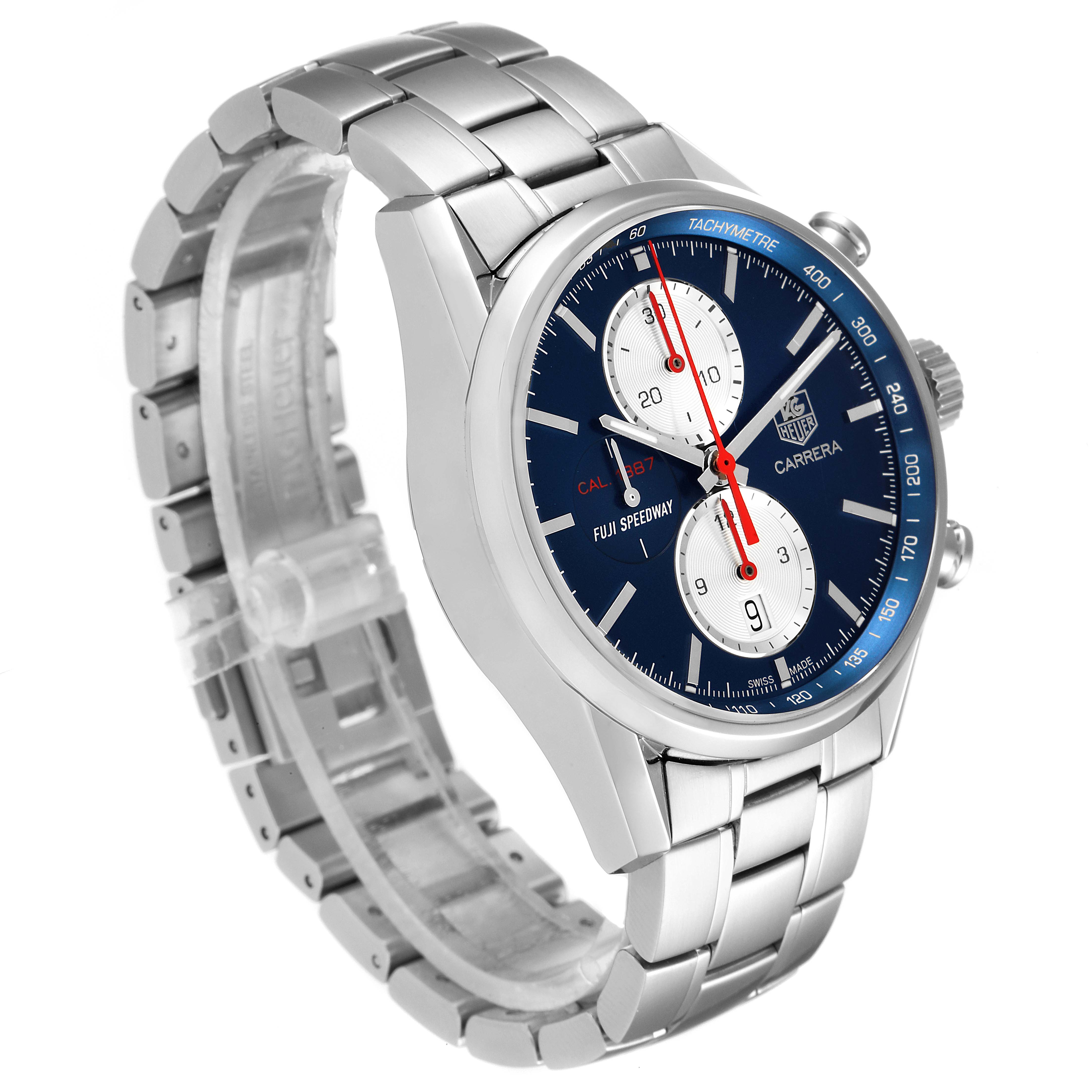 The image shows a side angle of a Tag Heuer Carrera watch, highlighting its face, chronographs, and stainless steel bracelet.