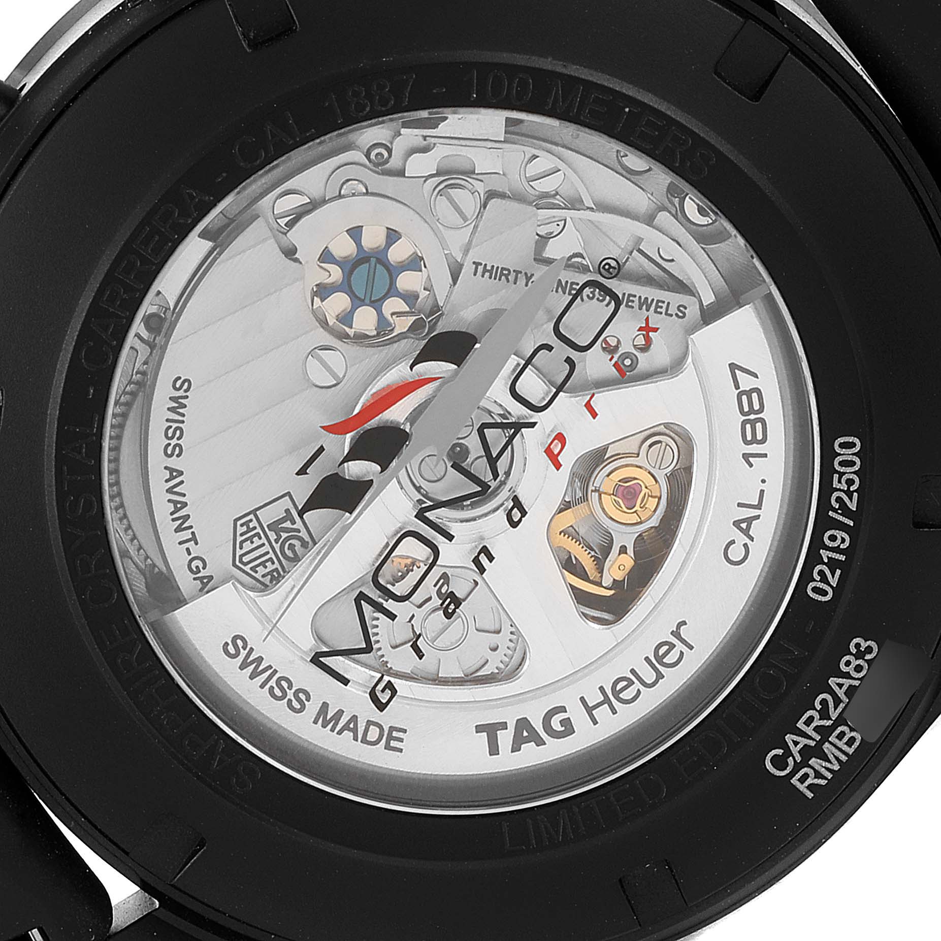 This image shows the back casing and internal mechanisms of a Tag Heuer Monaco CAR2A83.FT6033 Men's Titanium Black Dial CAR2A83.FT6033 Men's Titanium Black Dial watch at a close-up angle.