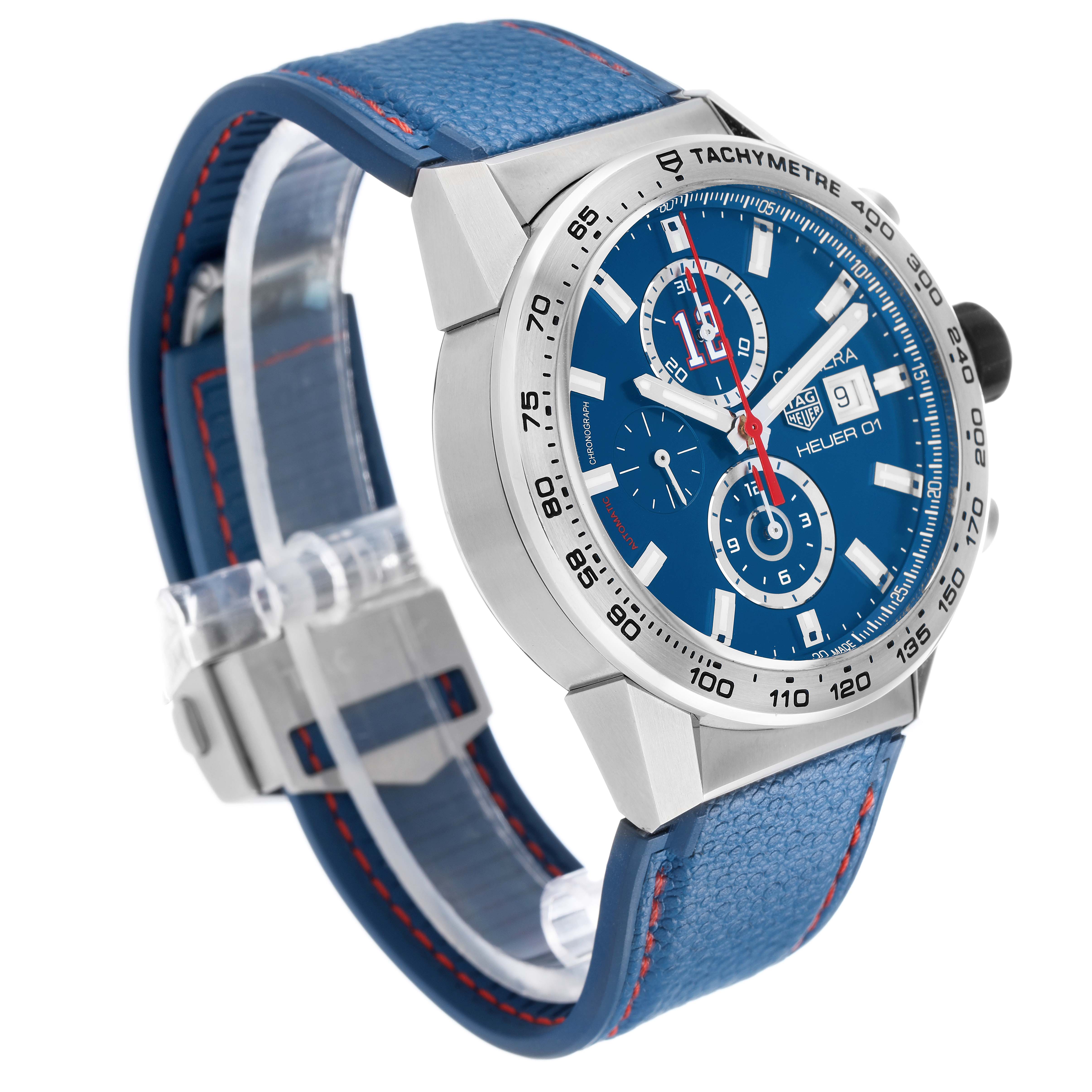 The Tag Heuer Carrera CAR201R Men's Stainless Steel Blue Dial watch is shown at a three-quarter angle, highlighting the blue dial, tachymeter bezel, and leather strap.