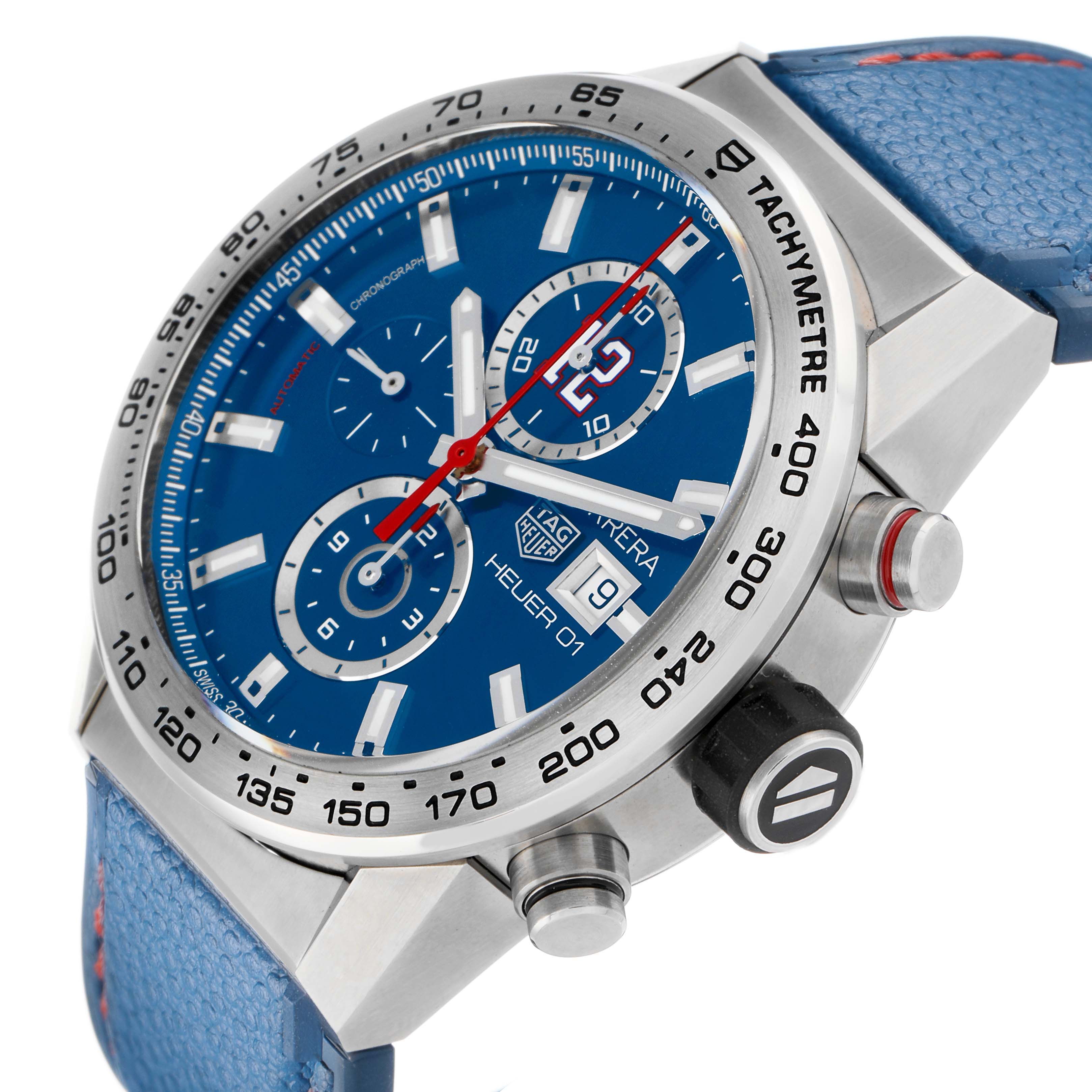 The Tag Heuer Carrera CAR201R Men's Stainless Steel Blue Dial watch is shown from an angled view, displaying the dial, tachymeter bezel, crown, and pushers.