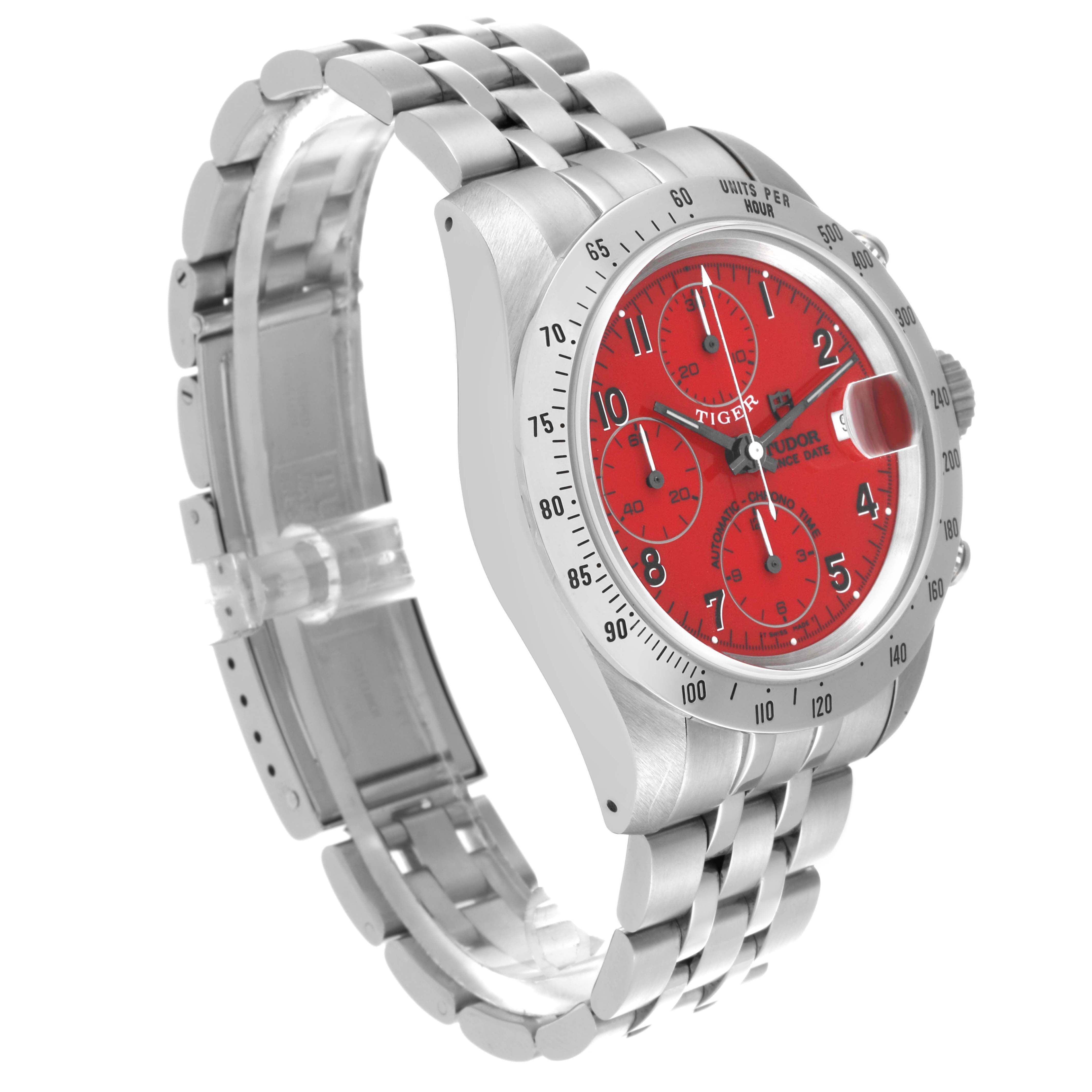 The Tudor Tiger 79280 Men's Stainless Steel Red Dial 79280 Men's Stainless Steel Red Dial watch is shown at an oblique angle, highlighting the red dial, bezel, crown, and metal bracelet.