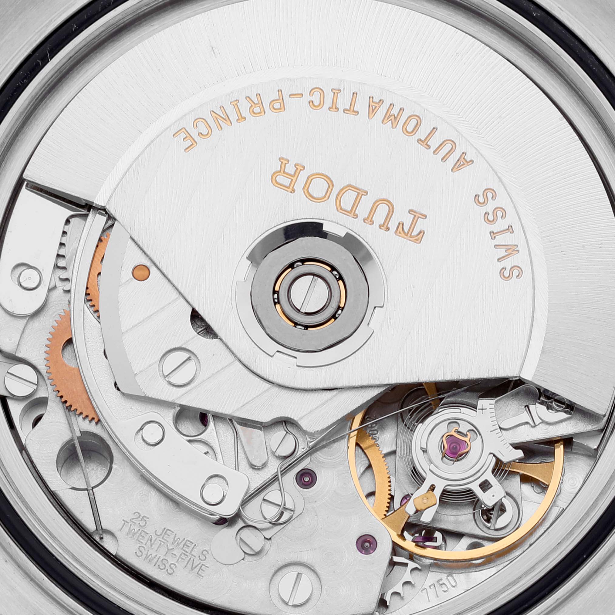This is a close-up of the internal mechanism of the Tudor Tiger 79280 Men's Stainless Steel Red Dial 79280 Men's Stainless Steel Red Dial model watch, highlighting the gears and movement components.