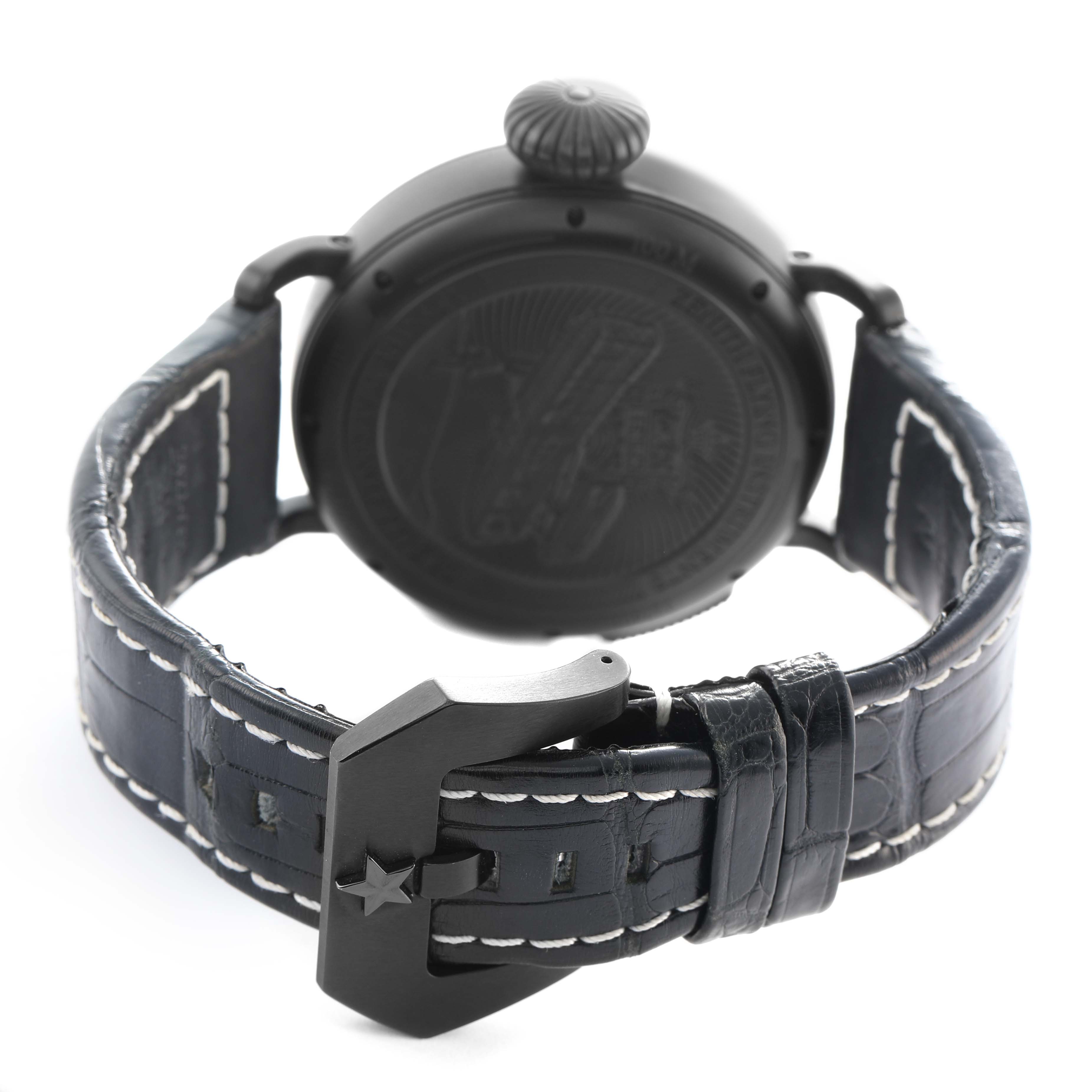 The image shows the back and strap of a Zenith Pilot 96.2436.693 Men's Titanium Blue Dial watch, featuring a black buckle and embossed case back.