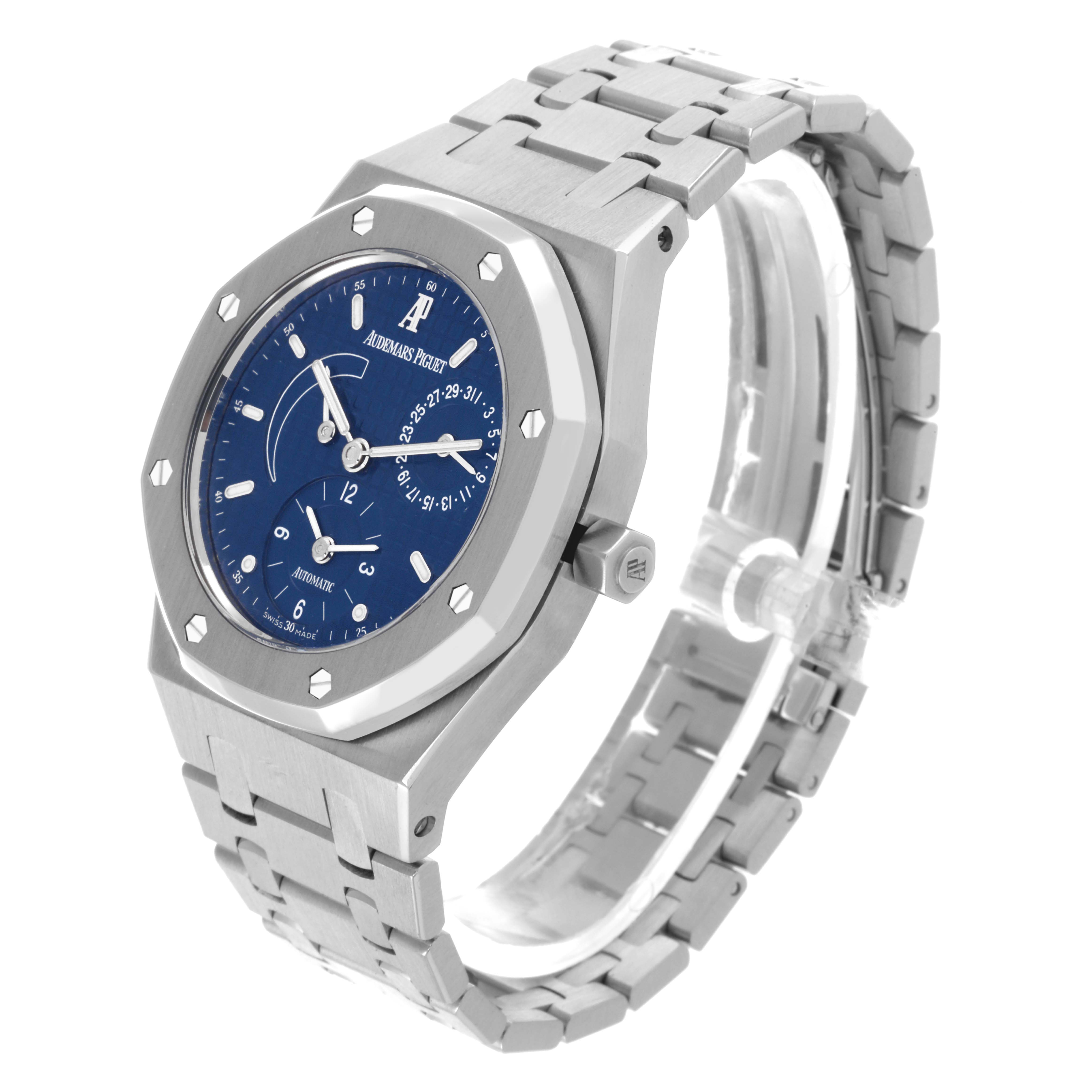 The Audemars Piguet Royal Oak 25730ST Men's Stainless Steel Blue Dial 25730ST Men's Stainless Steel Blue Dial watch is shown at a three-quarter angle, highlighting the bezel, dial, and bracelet.