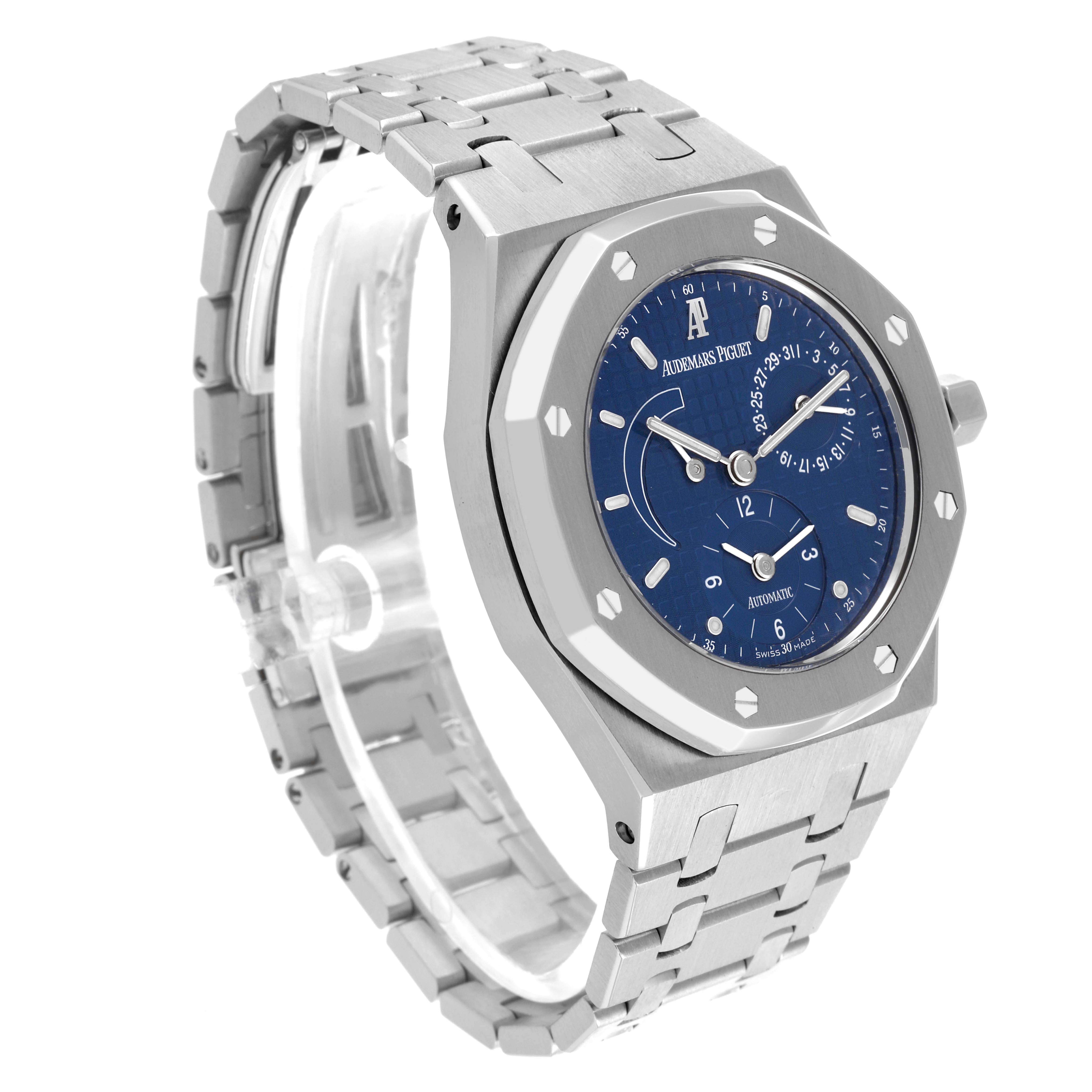 The Audemars Piguet Royal Oak 25730ST Men's Stainless Steel Blue Dial 25730ST Men's Stainless Steel Blue Dial watch is shown at a three-quarter angle, displaying its face, bezel, and bracelet.