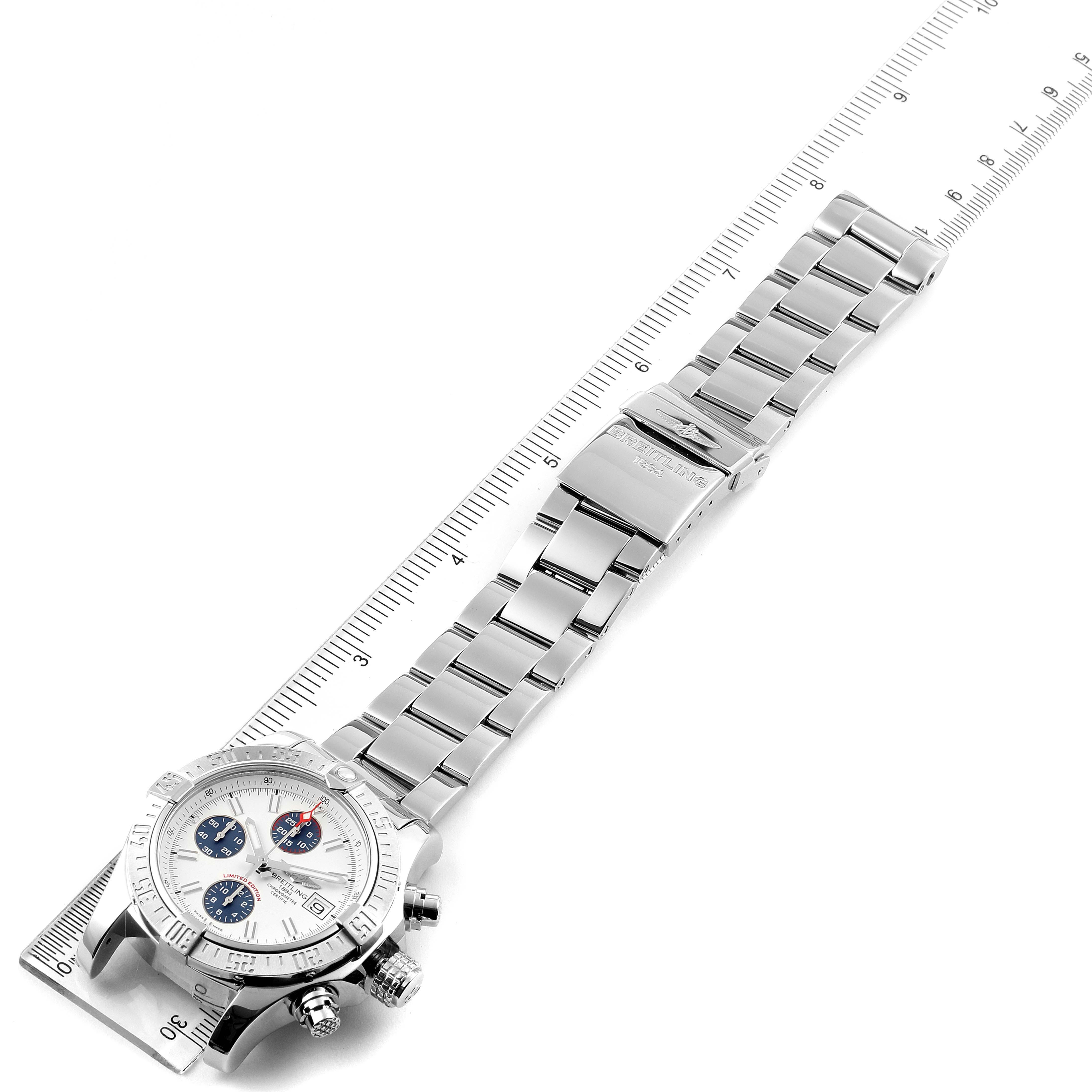 The image shows an overhead view of a Breitling Avenger A13381 Men's Stainless Steel White Dial A13381 Men's Stainless Steel White Dial watch, displaying the watch face, bezel, crown, and full metal bracelet.