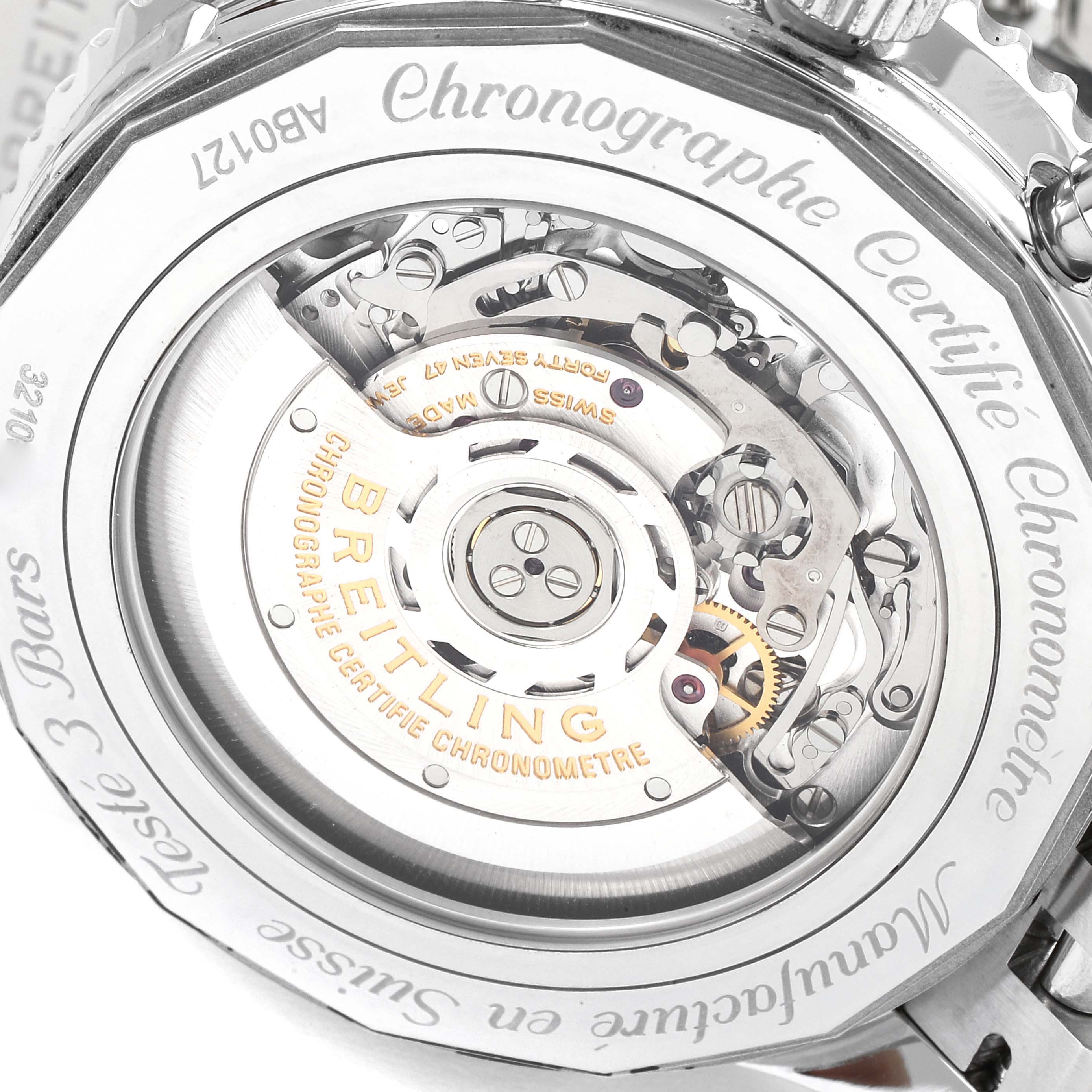 This image shows the back of the Breitling Navitimer AB012721-C889-453A Men's Stainless Steel Blue Dial AB012721-C889-453A Men's Stainless Steel Blue Dial watch, highlighting its open-caseback and internal mechanical movement.