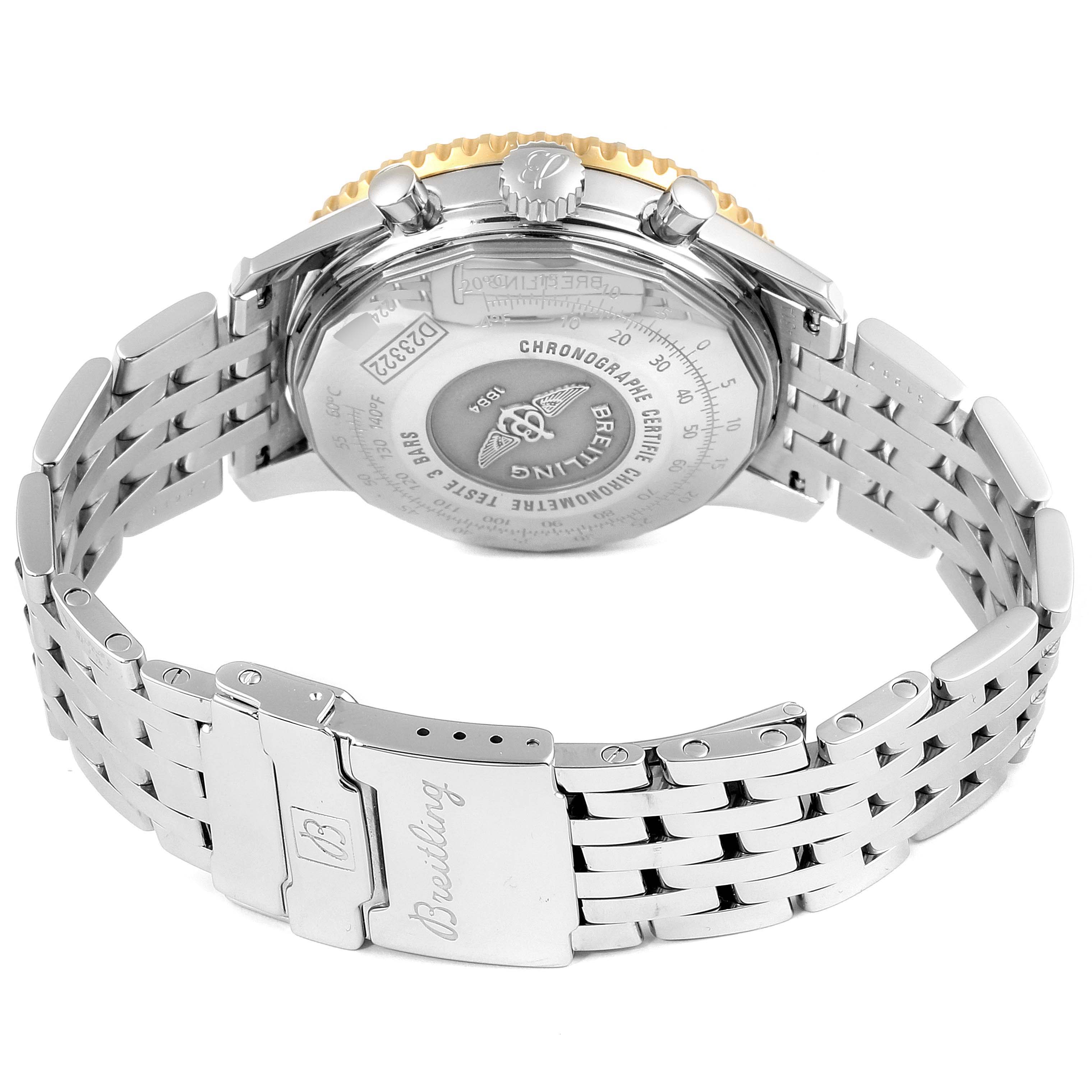 The image shows the back of a Breitling Navitimer D23322 Men's Steel and Gold (two tone) Black Dial D23322 Men's Steel and Gold (two tone) Black Dial watch, including its case back, crown, pushers, and part of the metal bracelet.