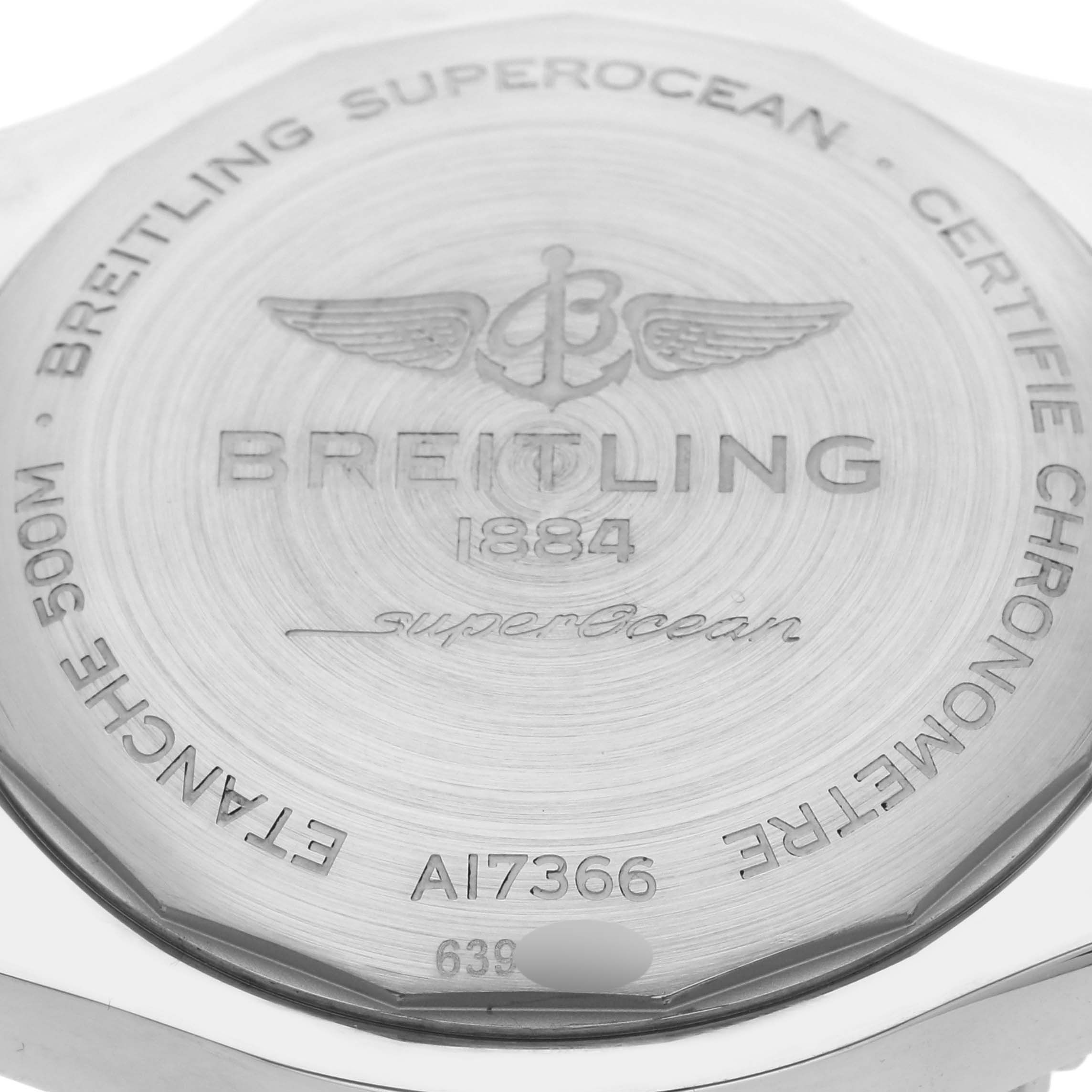 The image shows the engraved case back of the Breitling Superocean A17366 Men
s Stainless Steel White Dial A17366 Men
s Stainless Steel White Dial watch with branding details and model number.