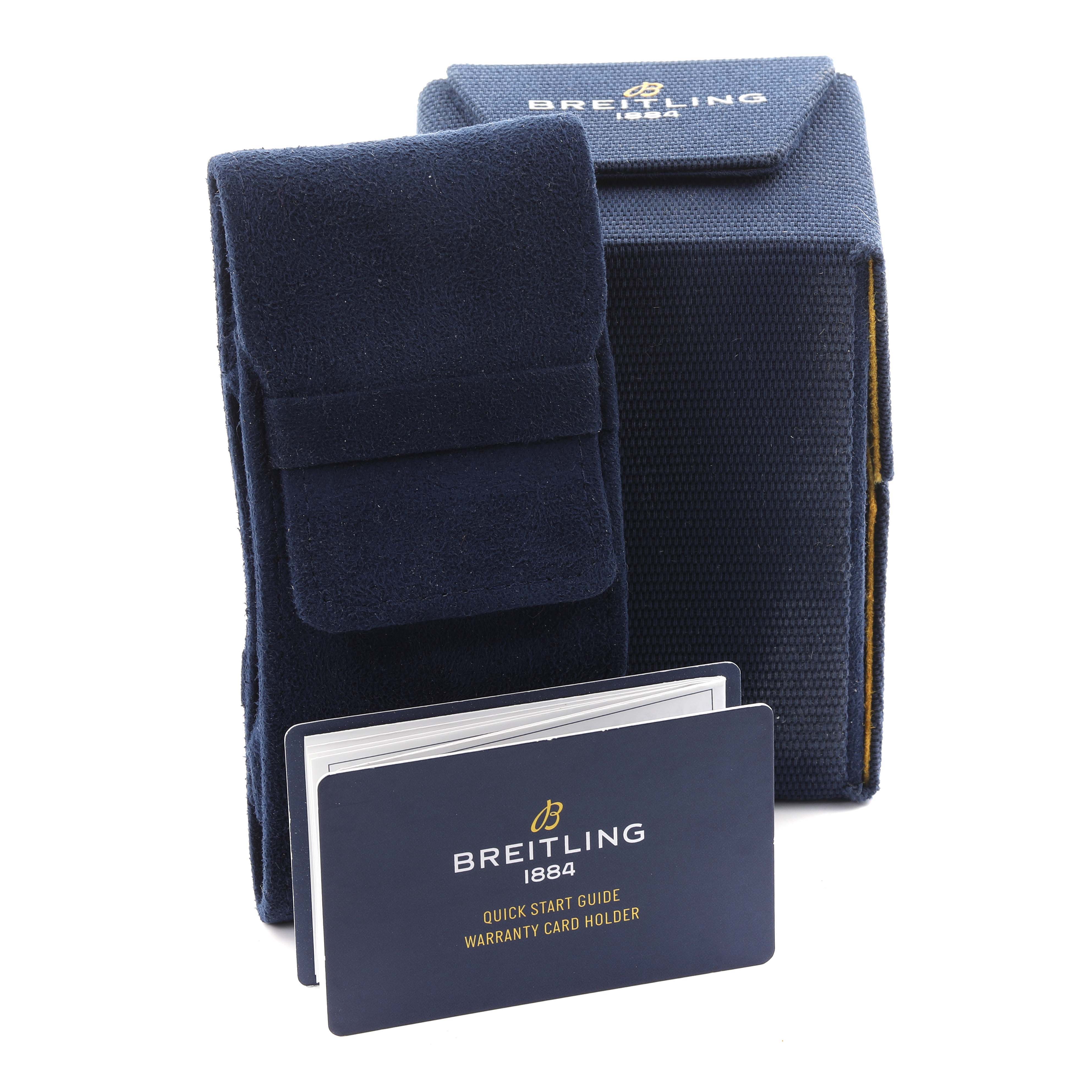 The image shows the Breitling Superocean A17367 Men
s Stainless Steel Yellow Dial A17367 Men
s Stainless Steel Yellow Dial watch accessories, including a case and warranty card holder, from a front angle.