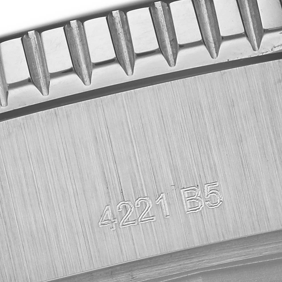 The image shows a close-up of the bezel edge and case side engraving on a Breitling Superocean A17367 Men
s Stainless Steel Yellow Dial A17367 Men
s Stainless Steel Yellow Dial watch.