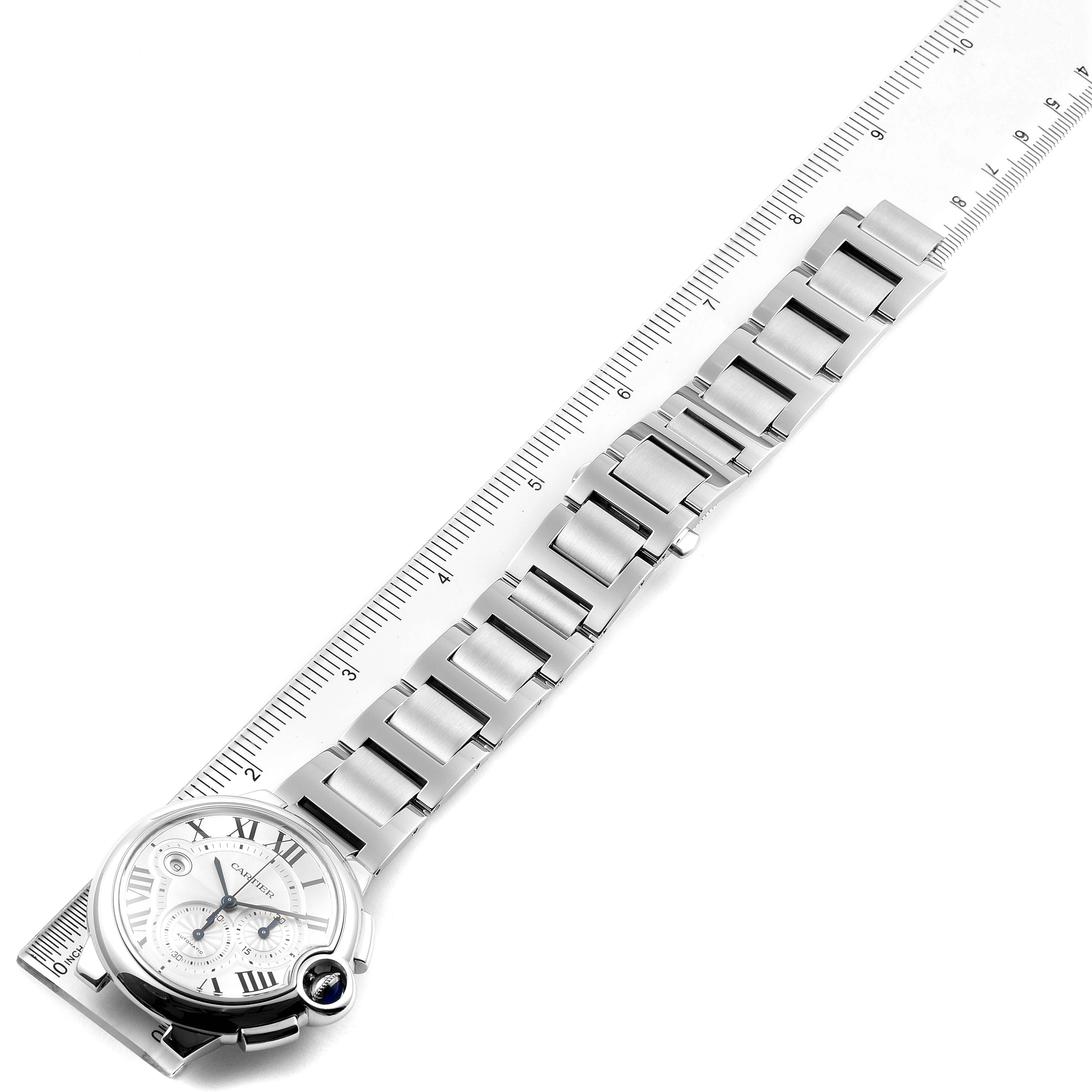 The image shows a Ballon Bleu model by Cartier, displaying the watch face, bracelet, and part of a ruler for measurement.