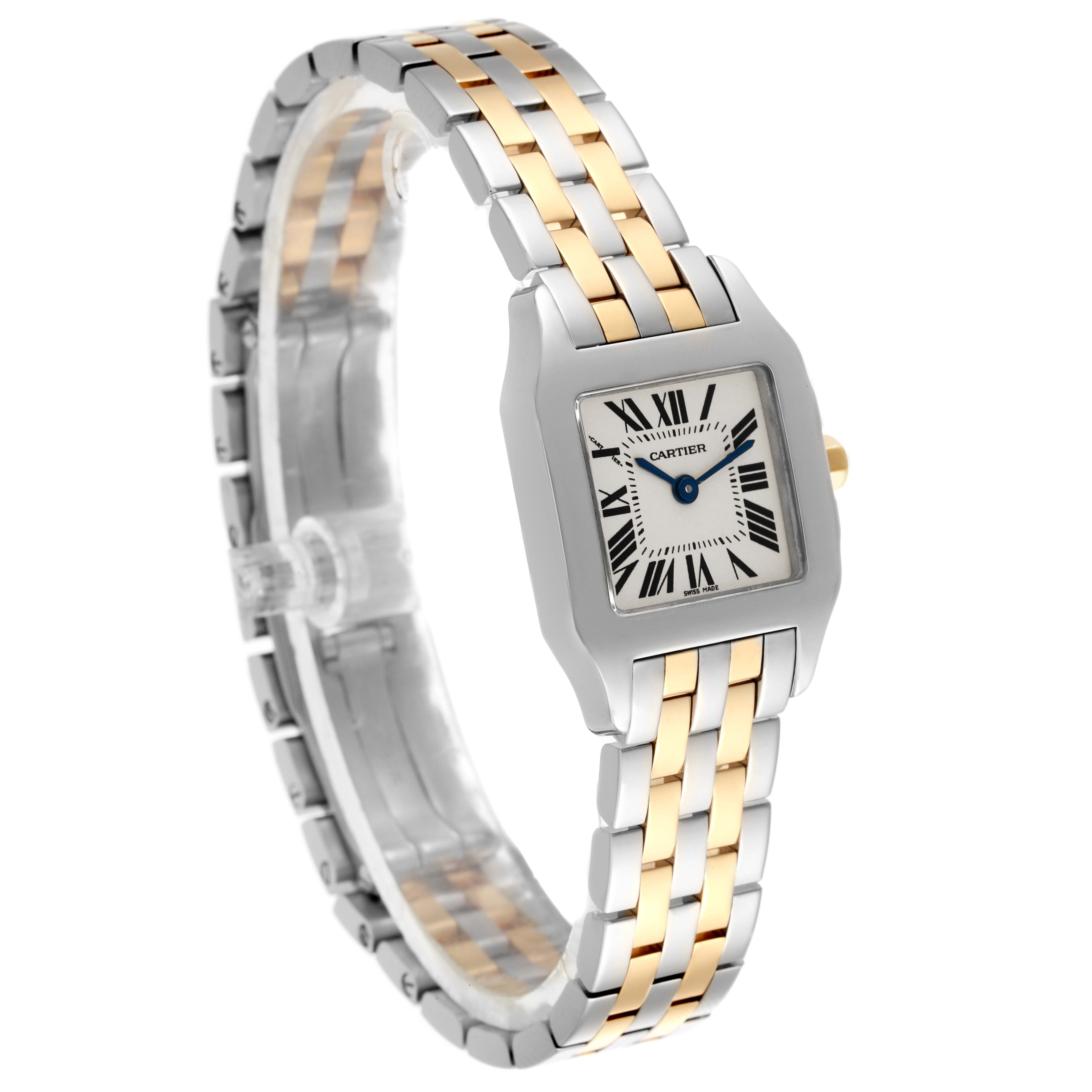 The Cartier Santos Demoiselle W25066Z6 Women
s Steel and Gold (two tone) Silver Dial W25066Z6 Women
s Steel and Gold (two tone) Silver Dial watch is shown at an angle highlighting the face and dual-tone bracelet.