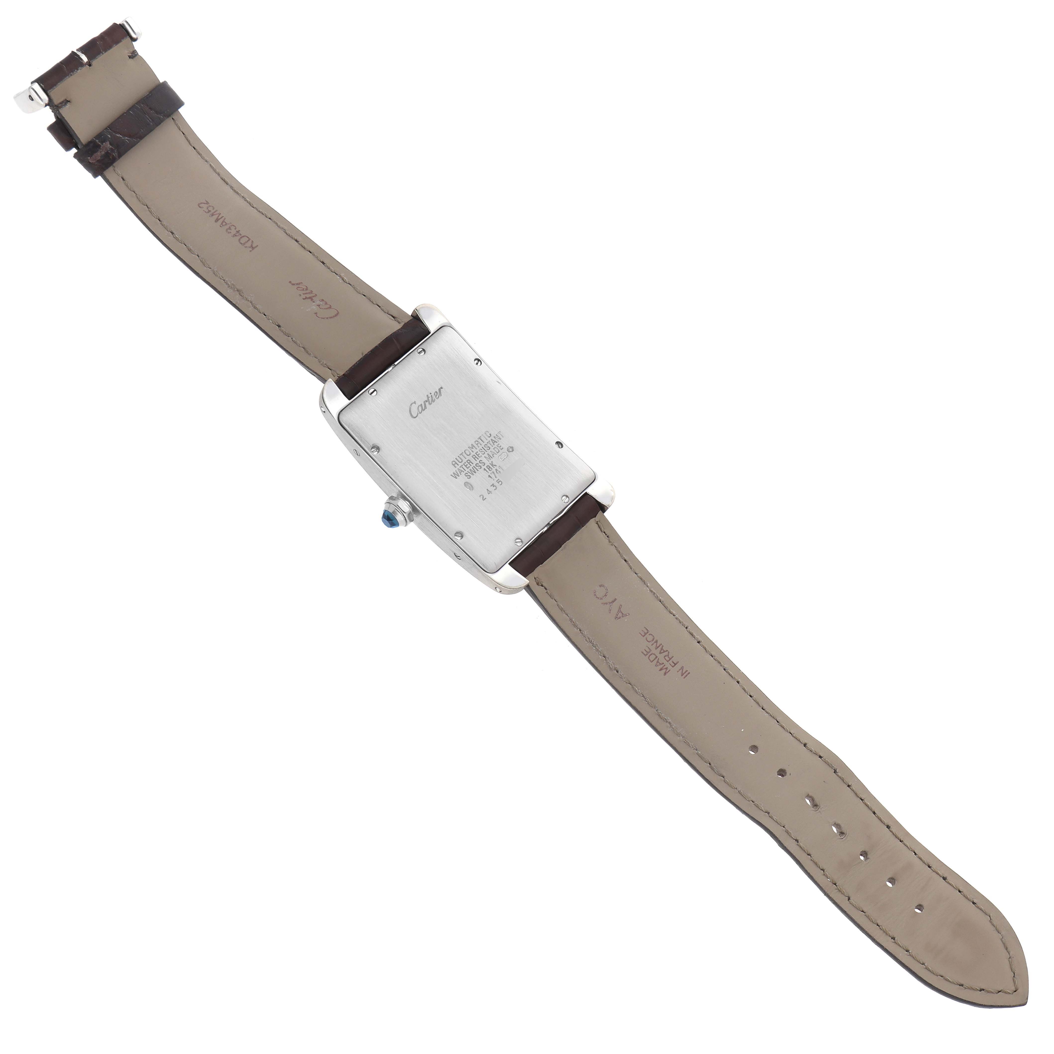 The image shows the back view of the Cartier Tank Americaine W2603256 Men's White Gold Silver Dial W2603256 Men's White Gold Silver Dial watch, highlighting the case back and strap.