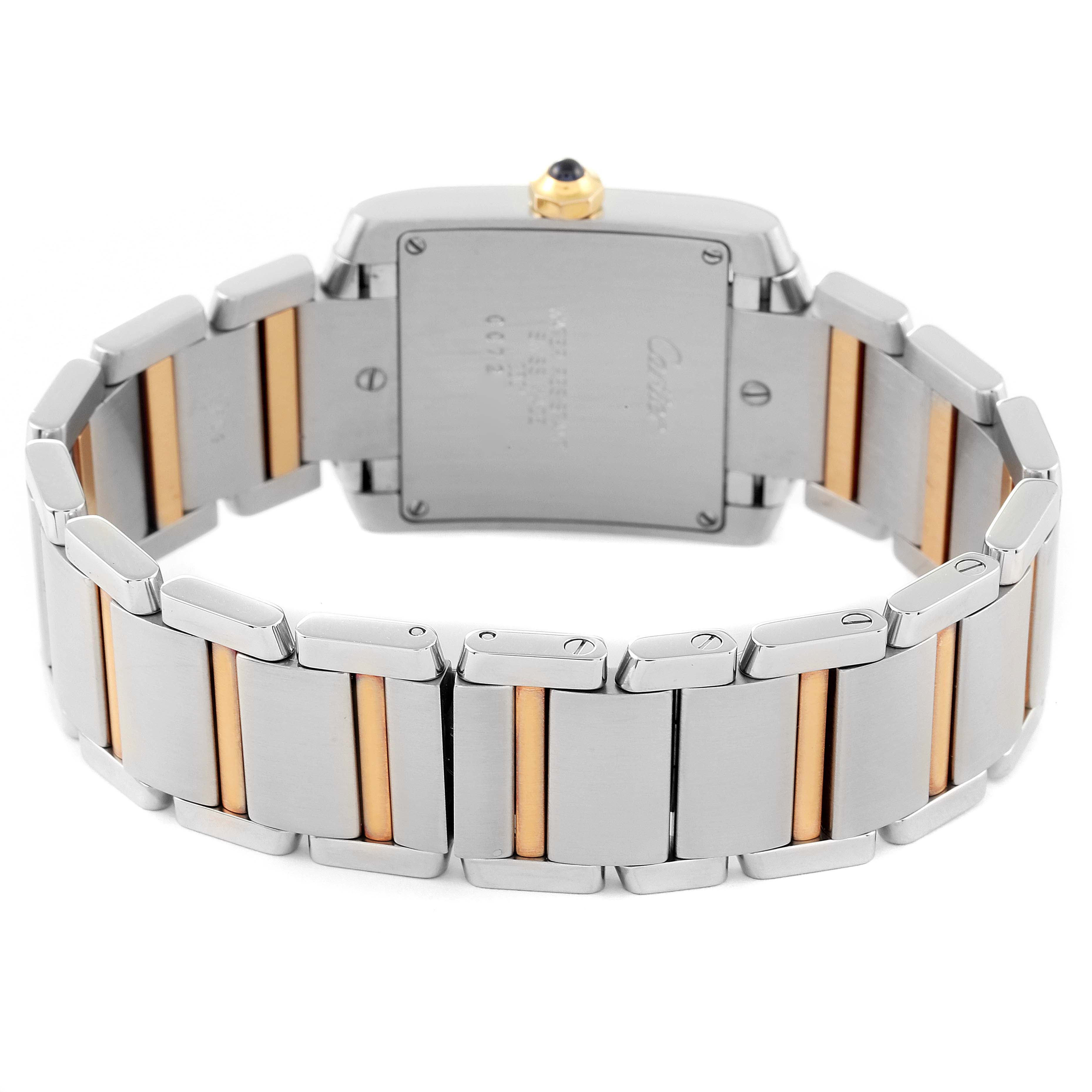 The image shows the back of the Tank Francaise model by Cartier, highlighting the bracelet and case back.
