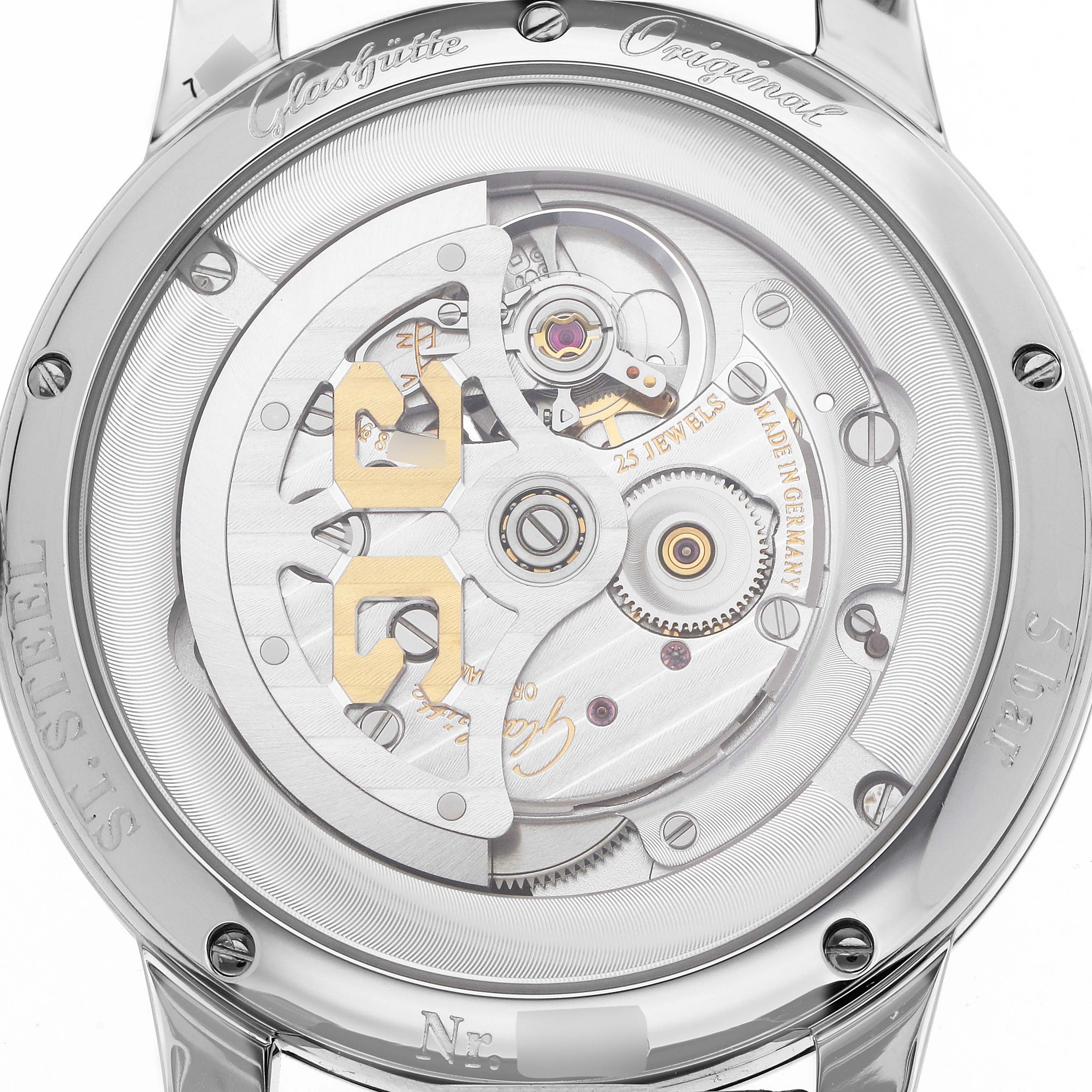 The image shows the back of a Glashütte Original watch, highlighting its intricate movement and mechanical details.