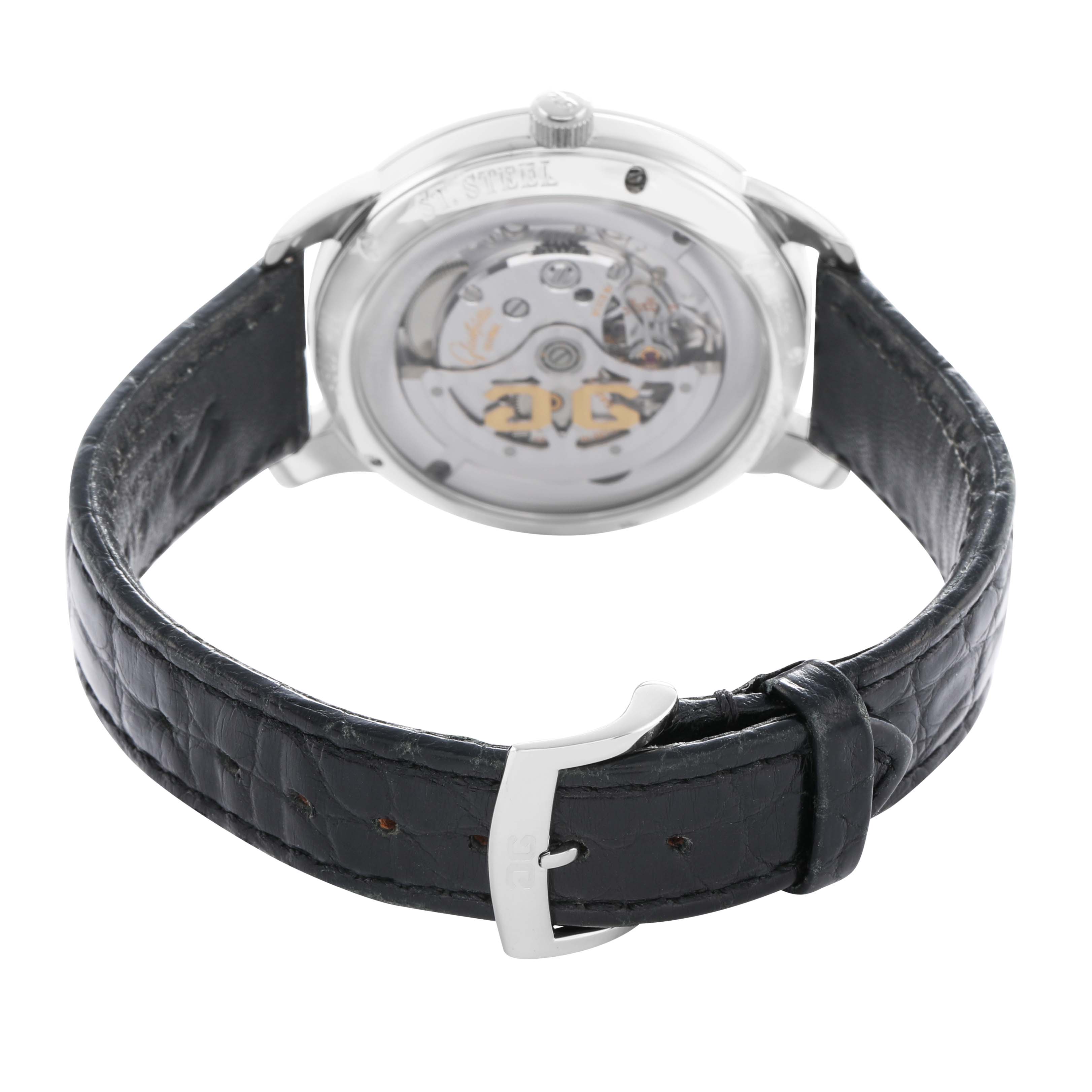 The image shows the rear view of the Glashütte Original watch, highlighting its transparent case back and black leather strap.