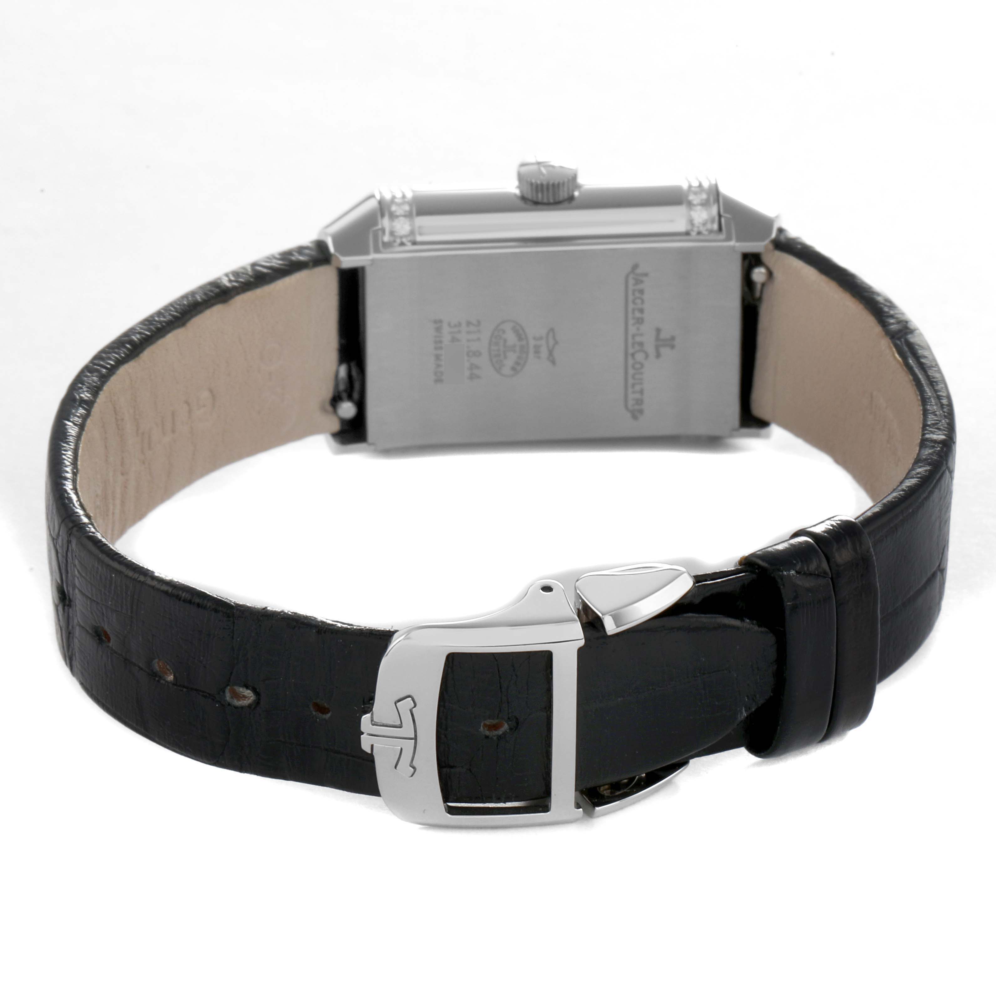 The image shows the back view of a Jaeger LeCoultre Reverso Q2668430 Women's Stainless Steel Silver Dial watch with its clasp and leather strap visible.