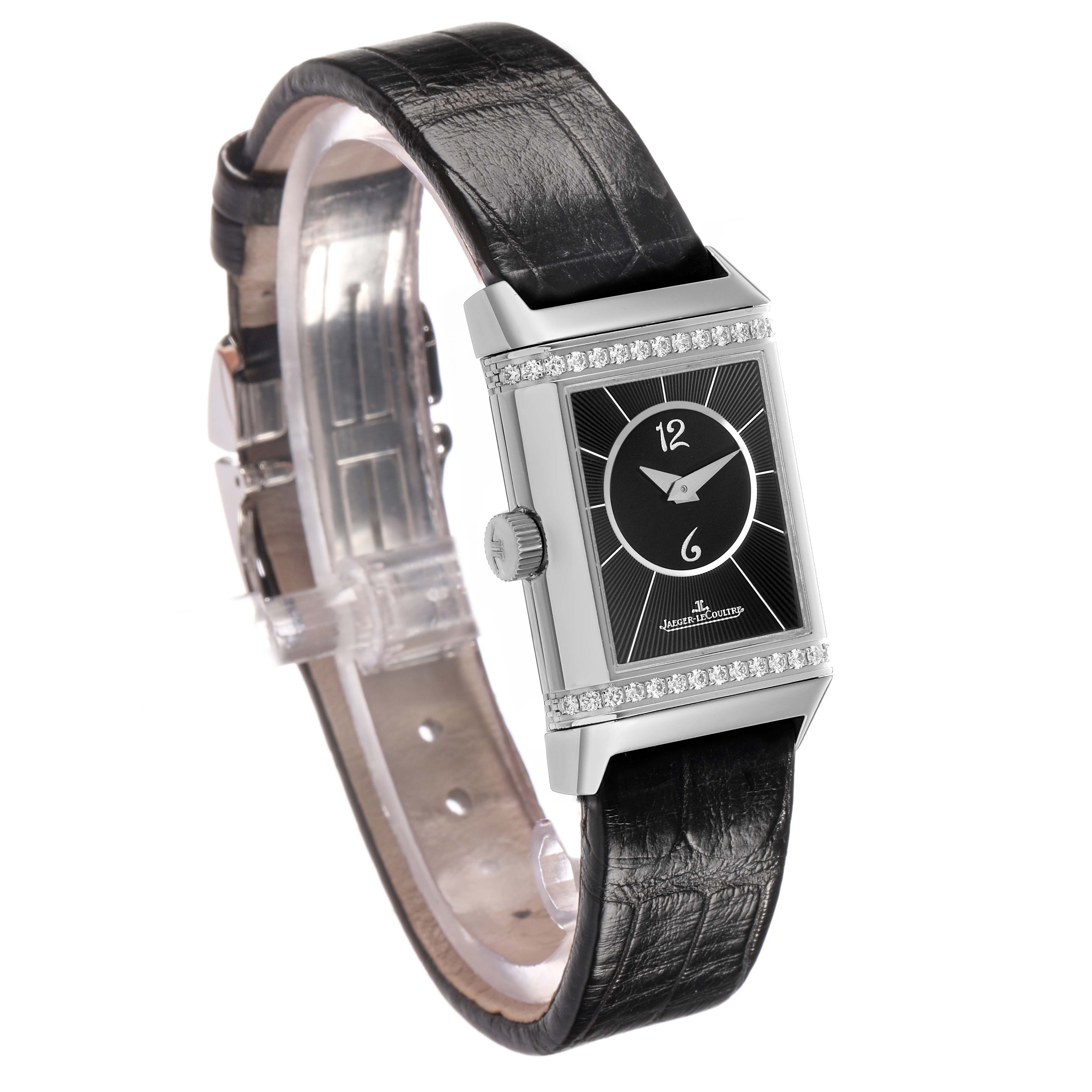 The watch is shown at a three-quarter angle, displaying the face, case, bezel, and strap of the Jaeger-LeCoultre Reverso model.