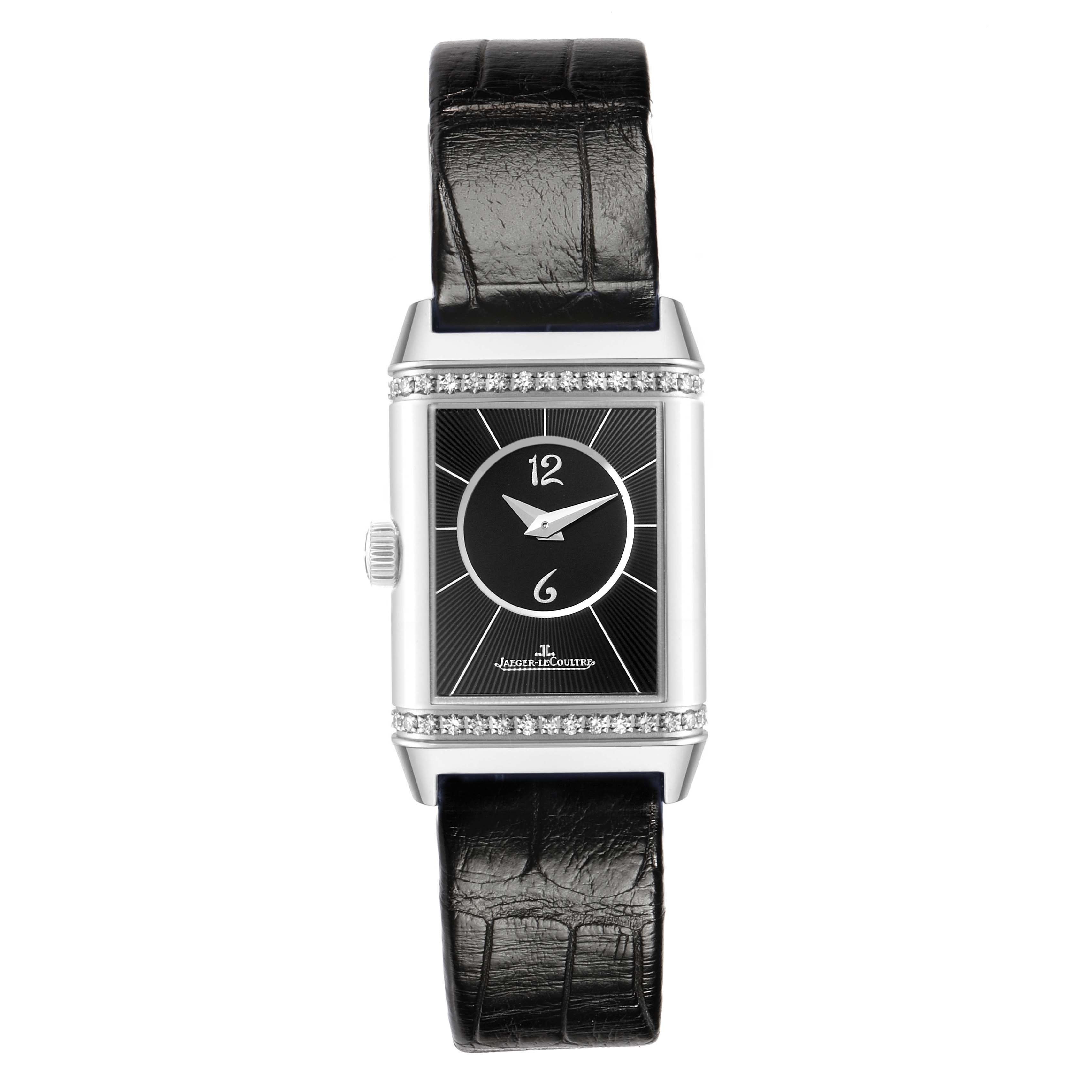 The Jaeger-LeCoultre Reverso watch is shown from a front angle, highlighting its rectangular face, case, and strap.