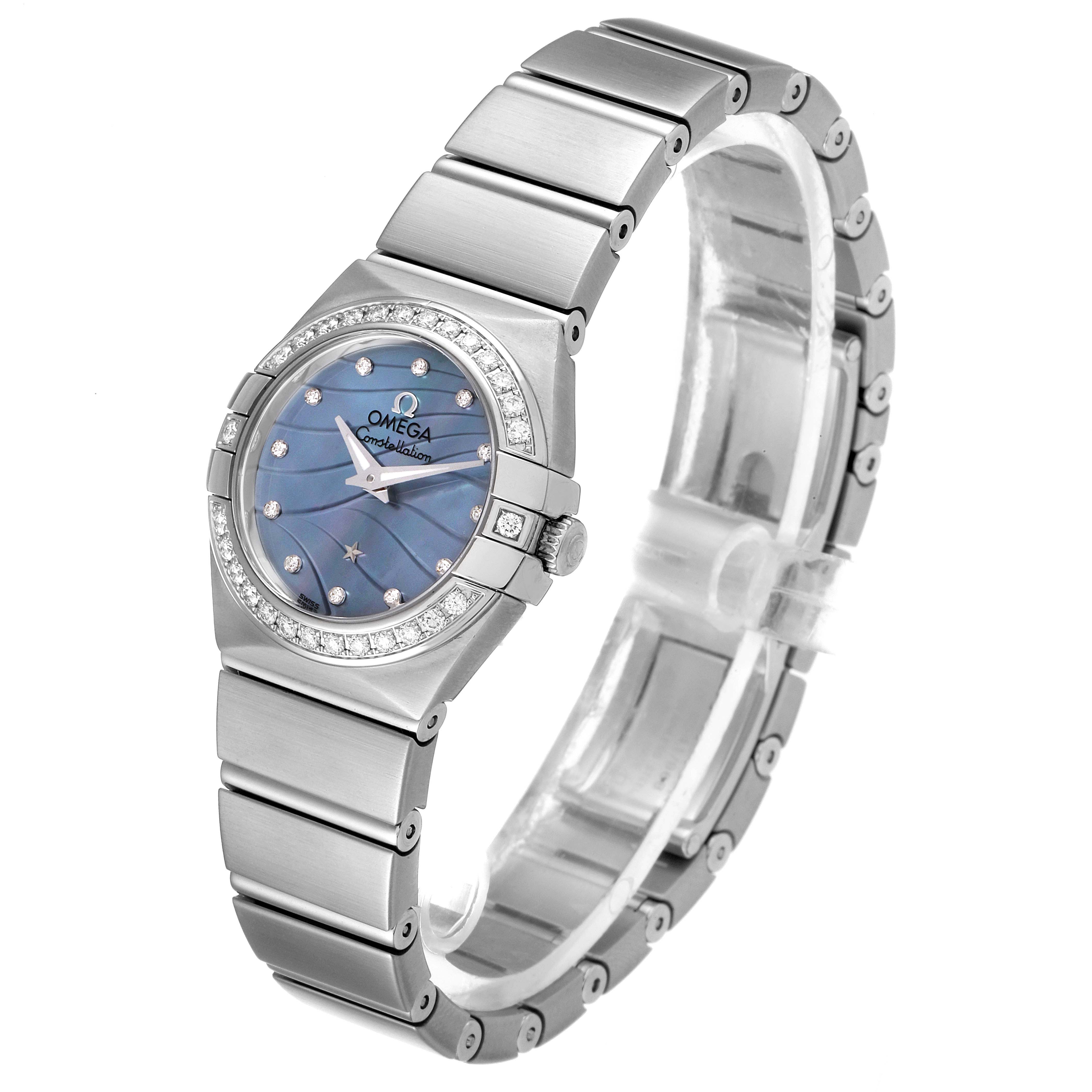 The image shows an angled view of the Omega 123.15.24.60.57.001 Women's Stainless Steel Mother of Pearl Dial 123.15.24.60.57.001 Women's Stainless Steel Mother of Pearl Dial Constellation Mother of Pearl Diamond Steel Ladies Watch 123.15.24.60.57.001, highlighting its face and bracelet.