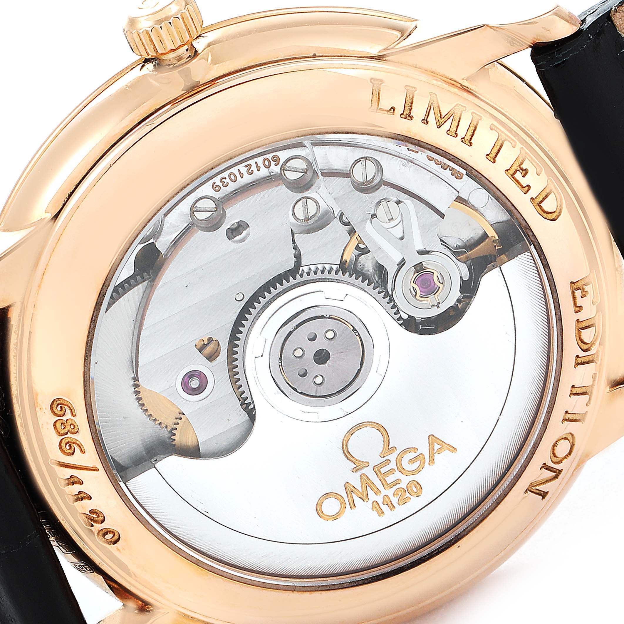 This is a close-up image showing the back case and movement mechanism of the Omega De Ville 4601.54.11 Men's Rose Gold Black Dial 4601.54.11 Men's Rose Gold Black Dial model watch.