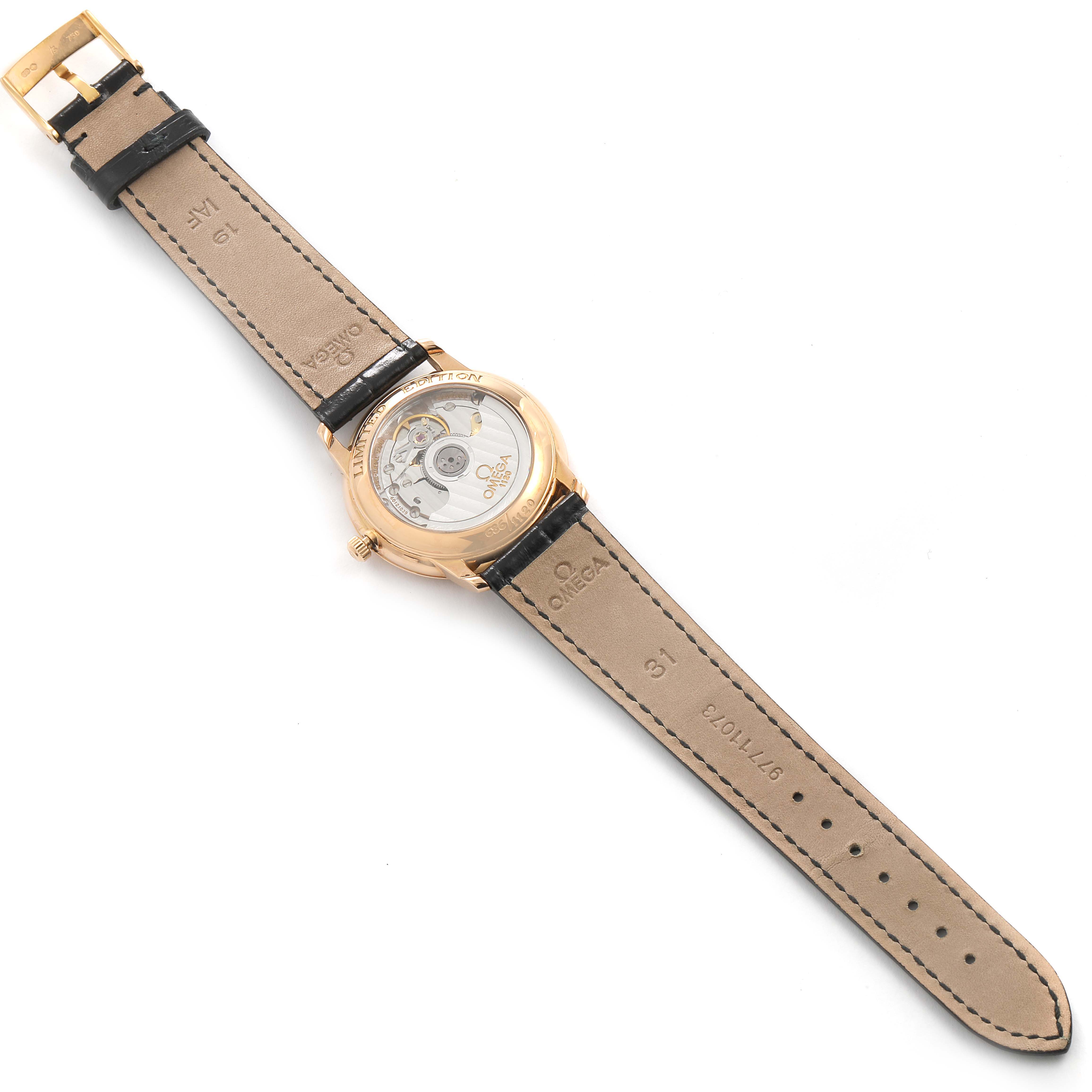 The image shows the back view of an Omega De Ville 4601.54.11 Men's Rose Gold Black Dial 4601.54.11 Men's Rose Gold Black Dial watch, highlighting its open case back and leather strap.