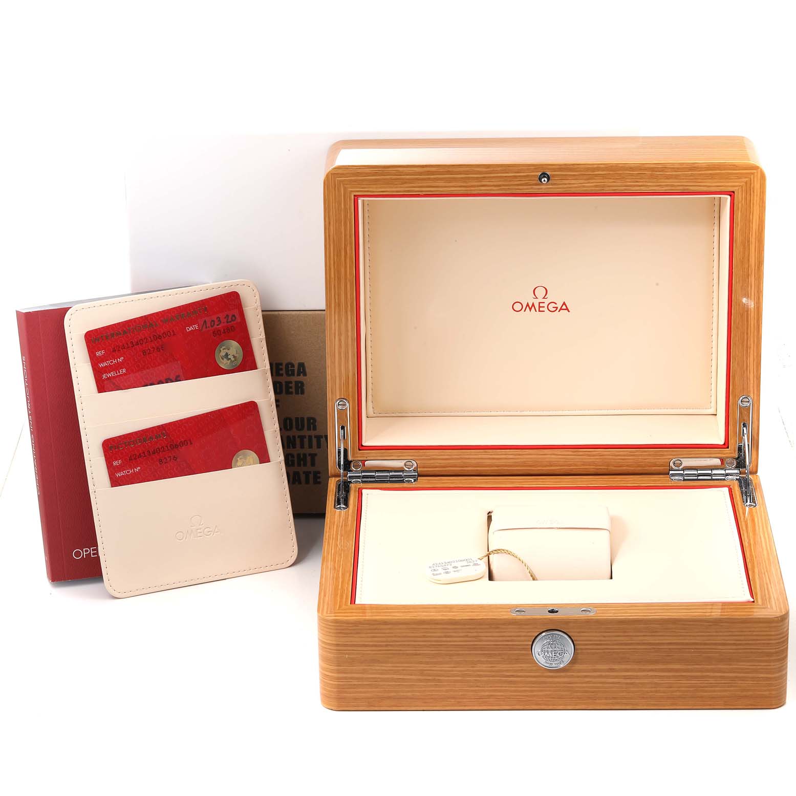 The image shows the open wooden box of an Omega De Ville 424.13.40.21.06.001 Men
s Stainless Steel Grey Dial 424.13.40.21.06.001 Men
s Stainless Steel Grey Dial watch, with warranty cards and a cardholder next to it.