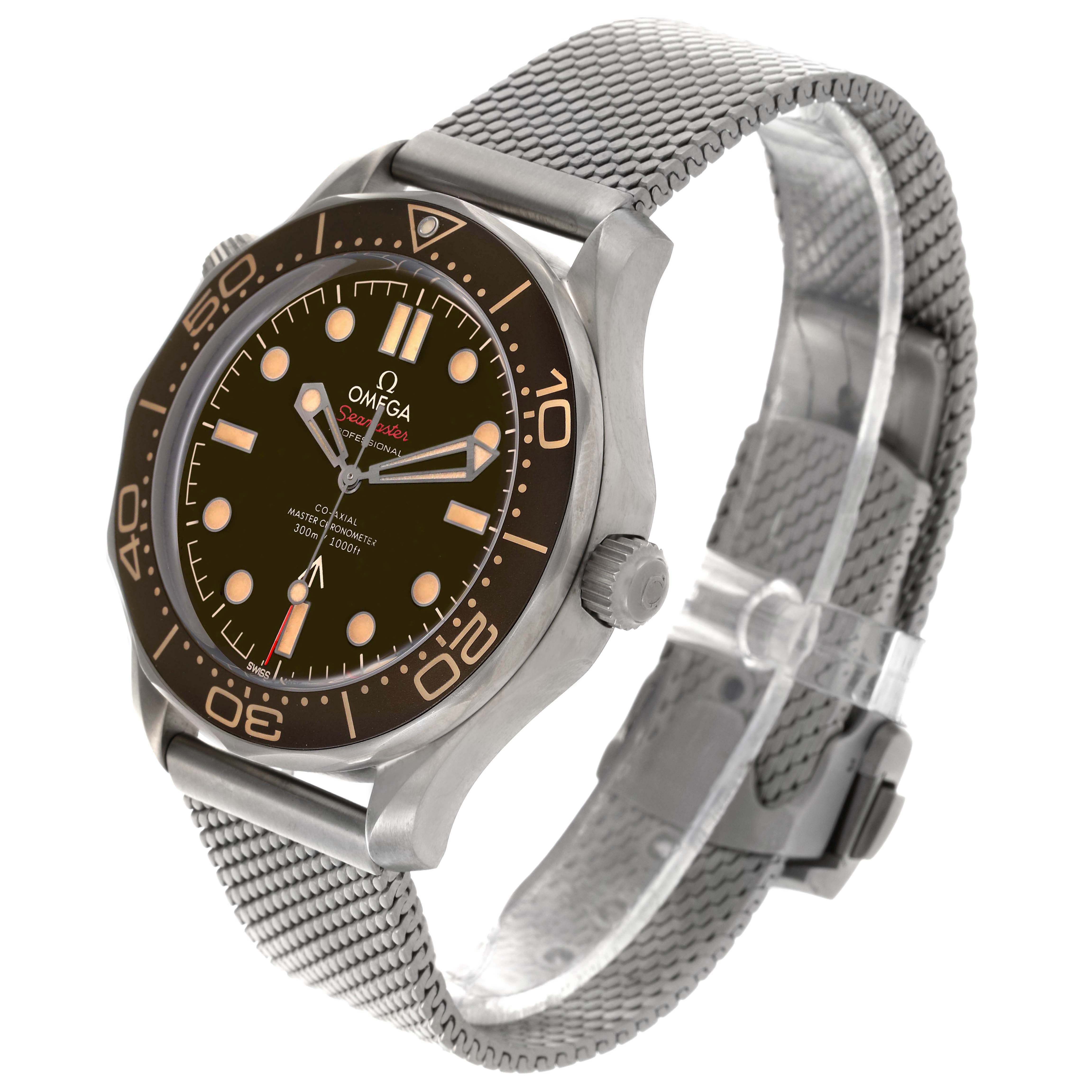 The Omega Seamaster 210.90.42.20.01.001 Men's Titanium Brown Dial watch is shown at an angle highlighting the dial, bezel, crown, and metal mesh bracelet.