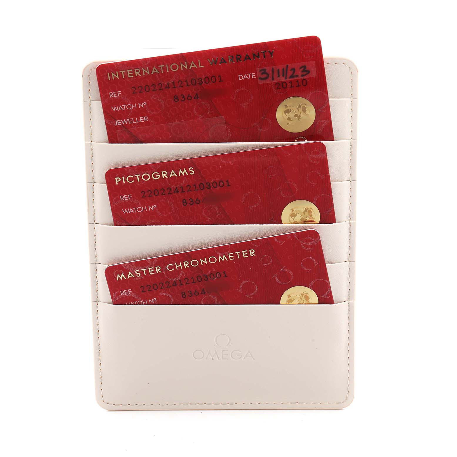 The image shows warranty and authenticity cards for the Omega Aqua Terra 220.22.41.21.03.001 Men's Steel and Gold (two tone) Blue Dial, displayed in a white cardholder.