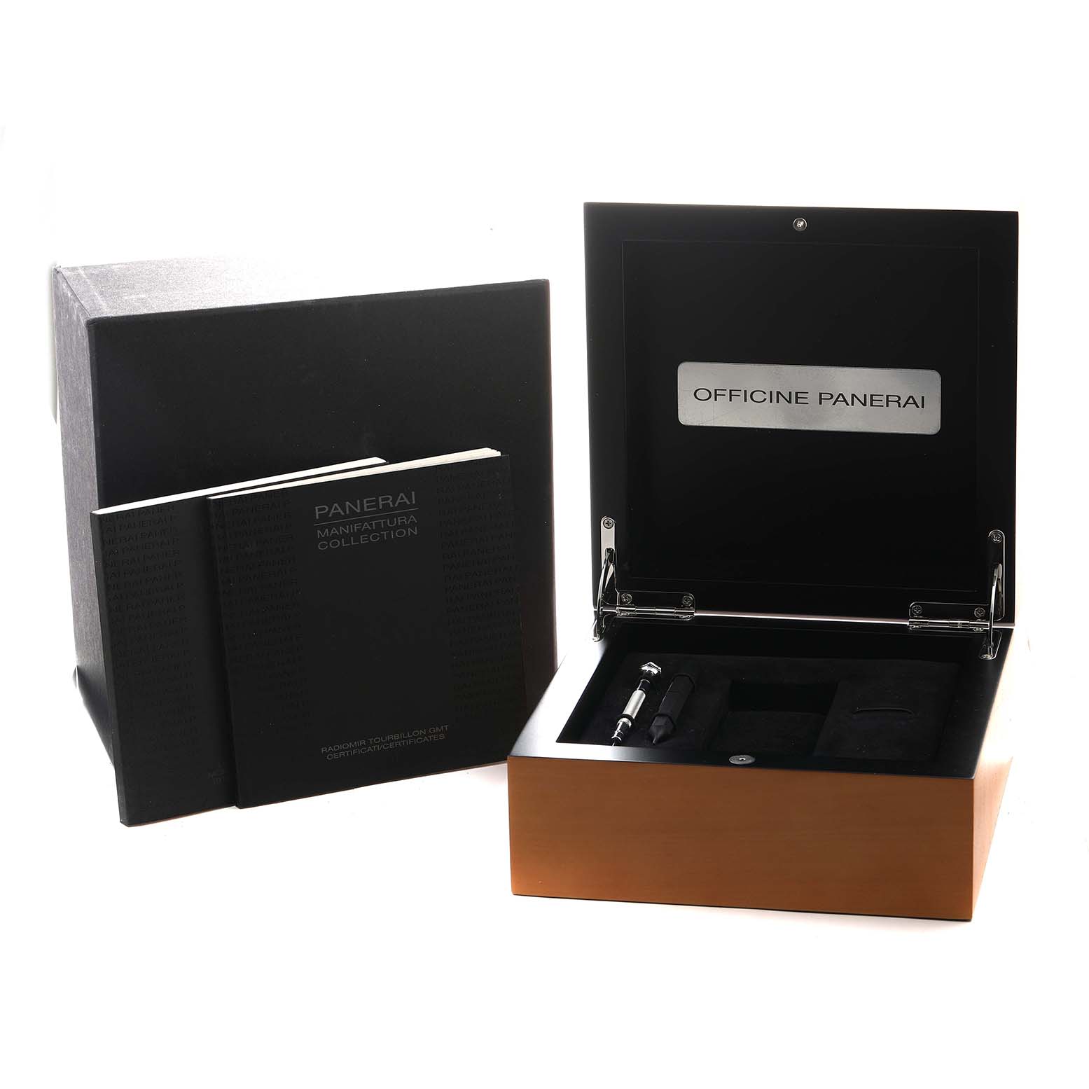 The image shows a Panerai Luminor PAM00275 Men's Stainless Steel Black Dial watch box open, revealing compartments and tools, alongside manuals and the outer box.