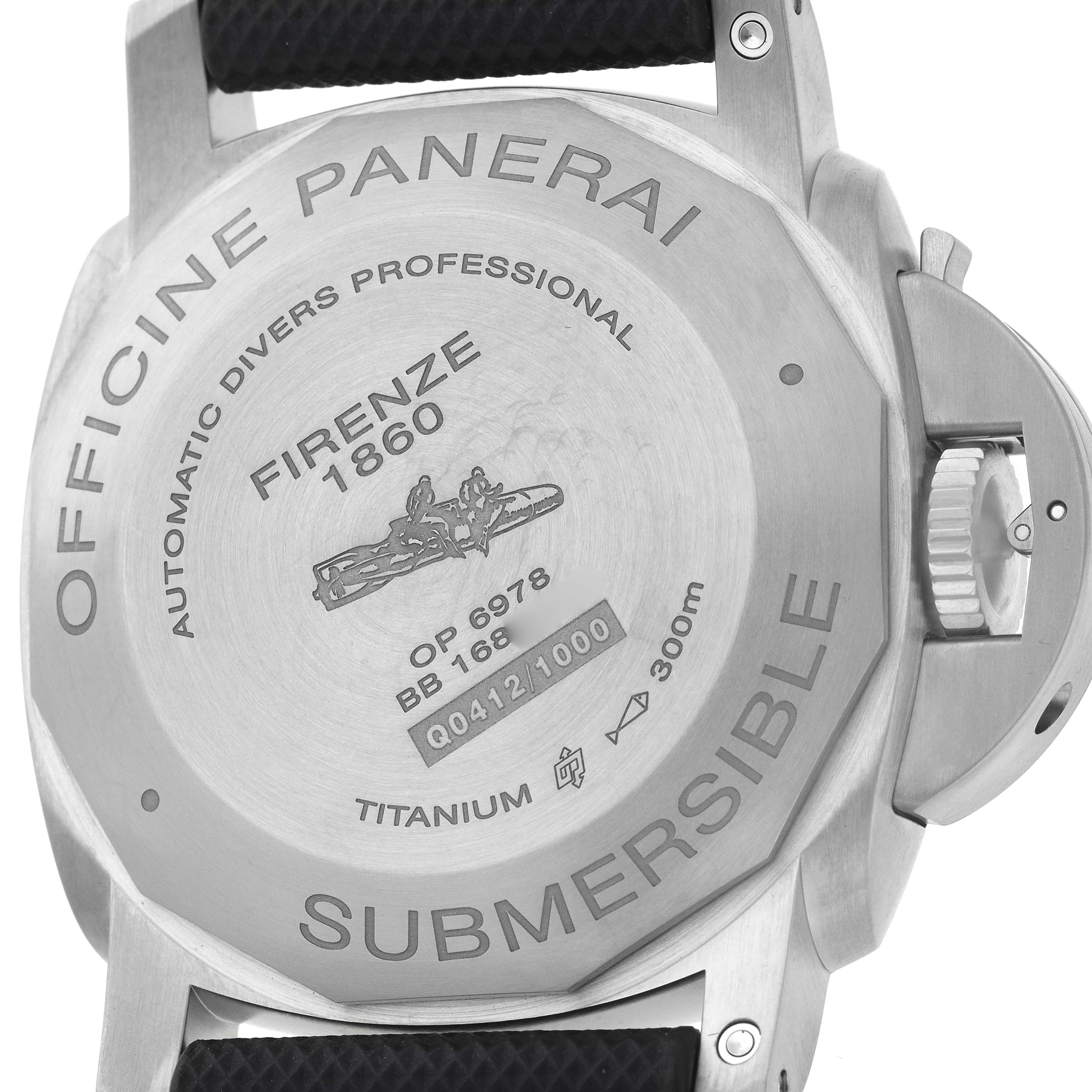 The image shows the back case and crown guard of a Panerai Luminor PAM00569 Men's Titanium Black Dial model, highlighting engraved details.